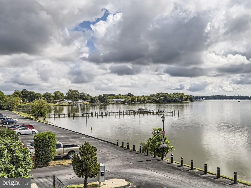 Welcome home  3 levels with 3 decks offering breathe taking water views from each level.  Inside Features over 1800 sq ft of living space, 3 bedrooms on the upper level with new carpet, 2.5 baths; primary suite offers 2 closets, private deck, and it's own full bath.  Enjoy pier access & a private street with 2 car parking and back yard off the spacious, eat in Kitchen with brand new stove.  Open concept main level with private deck and views of the water from the Living room, Dining room and kitchen.  Lower level features a walkout to a deck which is perfect for relaxing or entertaining while enjoying sunsets and sunrises across the water.  Home has been freshly painted, features new vanities and light fixtures in all baths, and new closet doors, with  plenty of storage.  Back yard has storage shed for additional storage. If you are looking for a relaxing oasis to call home for a while , that is centrally located, updated and well maintained, this is where your next chapter should begin.    Don't let this one slip away from you!