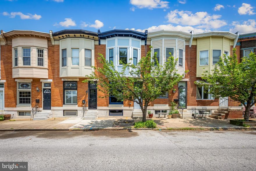 Step into this magnificent newly renovated Patterson Park front home. CHAP is pending. Three levels of finished space with new gleaming solid hardwood on 1st and 2nd floors and LVP in basement. The Spacious Main Level includes Living Room, Dining Room, and Large Kitchen with quartz countertops and backsplash and a waterfall island. The Upper Level offers 2 Bedrooms and 2 full baths; Primary bedroom has en-suite primary bath. Both bathrooms have elegant modern vanities and exotic marble tiles. Upper level interior access to deck and the roof-top deck with Skyline and Patterson Park views. The hallway is brightened by two skylights. Basement Level has 2 additional rooms and a third full bathroom. All new Stainless steel kitchen appliances, modern hood and a drawer microwave. Basement has full size washer and dryer. All electrical, plumbing, and HVAC are brand new! New spacious Parking Pad, Koehler plumbing fixtures and 3 Fans in living and bedrooms. Save on Chap tax credit!  *Photos virtually staged as an example.*