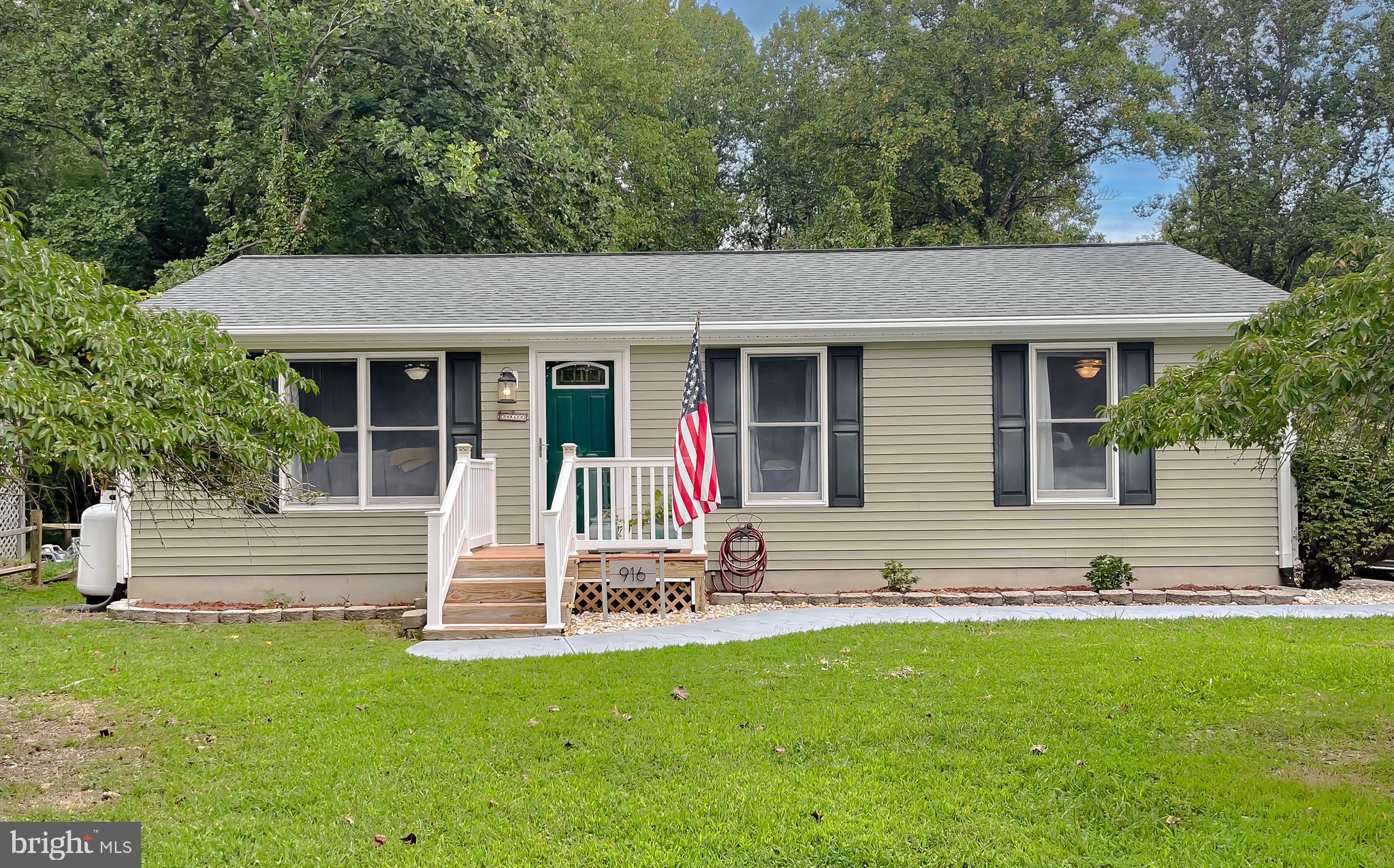 A D O R A B L E!!!! This adorable rambler is ready for a new owner. As you enter the home, the luxury vinyl flooring takes you to the family room, kitchen and dining area. The kitchen has been updated with granite counters and stainless appliances. The back door opens to the deck & large back yard perfect for entertaining and enjoying nature while grilling out. Very well maintained home with 3 bedrooms and 1 full bathroom. Long driveway that connects through the carport to the back street behind the house. Community amenities include beach access, picnic areas, playgrounds, and club house. Close to schools, shopping and area activities. Easy drive to Solomon's Island where you can walk and enjoy specialty restaurants and local boutiques. Close access to MD Route 4 for those commuting north to DC or south and over the bridge to PAX Naval Air Station. Schedule your online appointment today.