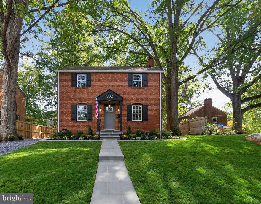 Updated Price!  Discover a gem in the heart of coveted Woodmoor! This classic colonial home, owned by the same family for the last 61-years, has been expertly renovated from top to bottom within the past year to include all new plumbing, electrical, and HVAC. With modern elegance, preserving its historic neighborhood charm, this ideal home is located on one of Woodmoor’s most desirable streets. With 5 bedrooms and 3 new full baths, each with WIFI & Bluetooth, 302 Penwood offers spacious and comfortable living. Every detail was meticulously designed and crafted with pride by a local master craftsman. On the main level, the covered entryway opens to a formal dining room with farmhouse lighting and a gracious living room featuring a masonry log burning fireplace. Through the living room, you will find a den/main level bedroom, perfect for multi-generational living/home office. This room has an en suite full bath with a walk-in-tiled shower, and porcelain tile floor. The 3 main level rooms have solid oak-stained flooring. Adjacent to the formal dining room is the beautiful and highly functional new kitchen which features granite countertops and backsplash, porcelain tile floors, custom cabinetry, including a floor to ceiling pantry. Under the kitchen cabinets you will appreciate lighting, concealed electrical strips and dimmable ceiling recessed lighting. Cook like a pro with the new GE Profile stainless steel appliances! On the upper level, you will find 4 generously sized bedrooms with solid cherry wood flooring and farmhouse lighting. All bedroom and linen closets are equipped with motion sensor lighting. The large bedroom at the rear of the house has a walk-in closet and enjoys a spectacular sweeping panoramic view of the beautifully landscaped wooded backyard. The full bath has a bathtub/shower combo with subway surround tiles, a decorative tiled wall with a glass niche, and porcelain tile flooring. All 3 levels have solid six-panel interior doors. Both main & upper levels have beautiful crown molding throughout. The fully finished lower level offers natural lighting with exterior windows and a doorway that exits to the attractively landscaped wooded backyard. Enjoy the lower level’s luxury vinyl plank floors, dimmable recessed lighting, and accent wall sconces. This level is ideal for entertainment, home office, workout area, guest space, an optional sixth bedroom and has a 3rd full bath. A separate enclosed area dedicated to laundry with a new GE Profile washer & dryer makes laundry well-organized. Never run out of hot water with the new commercial grade tankless hot water heater! As you exit the lower level you will find attached to the home a 210 square foot dry, enclosed, secure storage room with shelving, lighting, and electric. The private, wooded backyard is a peaceful retreat with mature trees, flowering azaleas, a dedicated fire pit & a shaded lower stone terrace for outdoor dining & conversation. The side yard has a 10'x12' concrete slab - ideal for a future shed. This beautifully landscaped and hardscaped exterior corner lot will invite outdoor gatherings, relaxation, and a lifetime of memories. Walkable lifestyle! Stroll to top-rated schools, parks, creeks, trails, and the vibrant Woodmoor Shopping Center with local shops, a classic bakery, a grocer, dining, and dessert options. Commuters: easy access to the Beltway (495), Rte 29, and Rte 200 (ICC). Great proximity to Silver Spring, Forest Glen, & Wheaton Red Line Metro stops. Convenient bus lines on University Blvd and Rte 29. A 30 minute ride to Reagan National & BWI Airports. Community traditions are second-to-none in Woodmoor! Summer block parties, holiday decoration contests, youth sports, local fields & more. An unbelievable opportunity! Own a meticulously renovated, move-in-ready home in one of the DMV area’s most sought-after neighborhoods. Don’t miss your chance to own a piece of Woodmoor history with all the comforts of today!