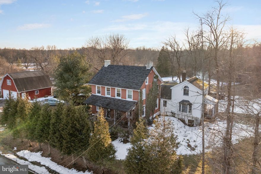 Nestled in a charming setting on almost 3.5 acres, this exquisite farmhouse-style residence exudes warmth and character, offering a perfect blend of modern comfort and timeless elegance. Built in 1900, this detached home has been thoughtfully maintained, showcasing its rich history while providing all the conveniences of contemporary living. Step inside to discover a spacious layout that invites you to unwind and create lasting memories. The heart of the home is the inviting eat-in kitchen, designed for both culinary enthusiasts and casual gatherings. Featuring a generous island, this space is perfect for entertaining or enjoying a quiet morning coffee. The kitchen seamlessly flows into the living areas, ensuring that every moment spent here feels connected and cozy. With four well-appointed bedrooms, this home provides ample space for relaxation and rejuvenation. Each room is bathed in natural light, enhancing the warm ambiance and creating a serene retreat. The two full bathrooms are thoughtfully designed, offering functionality, making daily routines a pleasure. The rich hardwood flooring throughout the main living areas adds a touch of sophistication. The main floor laundry adds convenience to your daily life, ensuring that chores are easily managed without sacrificing precious time. Additional structures, including a shed and garage, provide ample storage for all your outdoor equipment and hobbies. This home is not just a residence; it's a lifestyle. Imagine evenings spent on the porch, enjoying the tranquility of your surroundings, or hosting gatherings in the expansive kitchen. The charm of this farmhouse-style home, combined with its modern amenities, creates an inviting atmosphere that feels like a true sanctuary. Experience the perfect blend of history and modern living in this stunning property, where every detail has been curated for comfort and style. This is more than just a house; it's a place to call home.