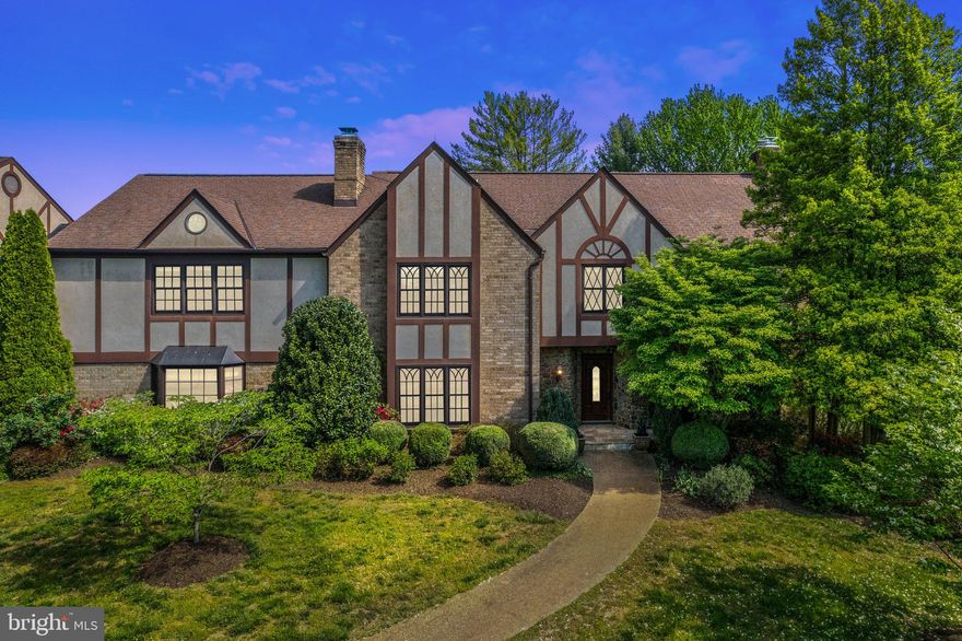 Located just a few miles outside of Warrenton, this storybook Tudor style home is nestled on over 10 park like acres.  The home had extensive renovations in 2020 and features almost 5000 square feet of living space with 4 bedrooms and 5.5 bathrooms in the main residence.  The winding driveway leads to ample parking with a 3 car side load garage and circular driveway.  Center hall entry with library to the left with built-in shelving and parquet floors.  To the right you'll enjoy entertaining in the formal living room with fireplace and doors to covered balcony.  The renovated eat-in kitchen is adjacent to the formal dining room.  Tucked away is a cozy family room with stone hearth.  Upstairs you'll find the spacious primary suite with luxury primary bath and custom dressing room/closet.  Each of the bedrooms are en-suite with private bathrooms.  The upper level reading nook overlooks the grounds with breezeway to a huge room above the garage just waiting to be finished - think home office or private yoga studio - there are endless opportunities!!   The walk-out lower level is waiting for your personal touches.  Once you've made yourself at home in the main residence, take a walk to the pool complex.  It includes two dressing rooms each with bathrooms and showers, sauna and commercial kitchen as well as an additional outdoor kitchen/grill area.  This is entertaining at its finest.  Don't forget to take a walk to enjoy your own private pond and the perfectly landscaped grounds.  All this and so much more . . .