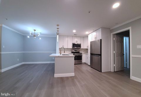 Photo of 1049 Gardenview Loop #302, WOODBRIDGE, VA 22191 (MLS # VAPW2112780)