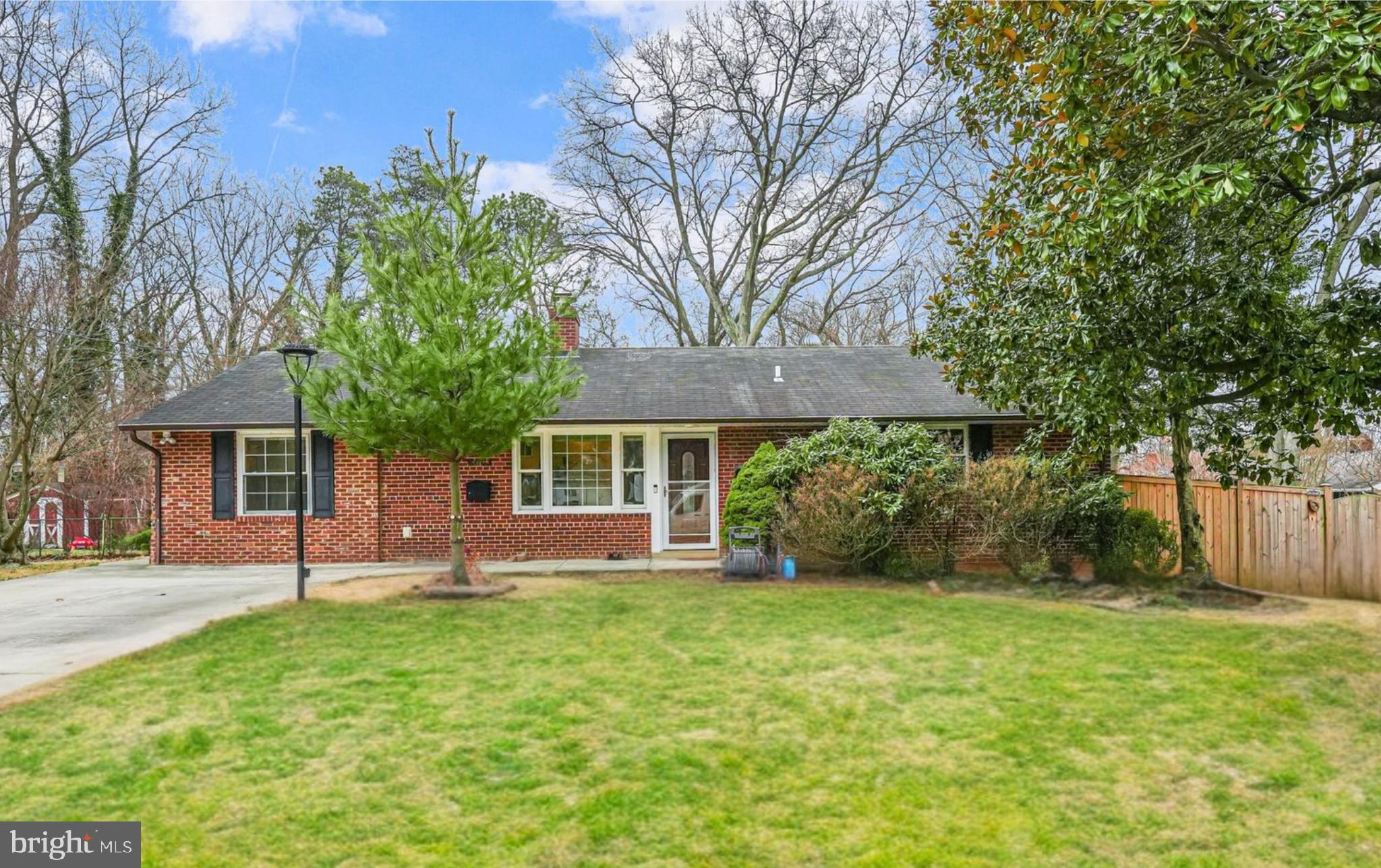 Step into timeless sophistication in this beautifully maintained 4-bedroom, 3-bath brick home that blends traditional charm with modern comfort. Rich hardwood floors flow throughout, enhancing the warmth of every room, from the formal dining area with crown molding and abundant natural light to the welcoming living spaces designed for effortless living. The home was fully renovated and expanded in 2015. New roof installed in 2025. Water heater replaced in 2020. Washer and Dryer Replaced in 2024. Home also features full house backup generator. Outdoor Gas Line is available for Grill! Concrete Driveway was installed in 2015. Full backyard Fence was installed in 2024. 
At the heart of the home, the chef’s kitchen is a dream: outfitted with stainless steel appliances, double ovens, detailed cabinetry, a wine rack, and a massive granite island perfect for gathering. The open-concept layout flows into a cozy family room, complete with a sleek stacked-stone fireplace that serves as a stunning focal point.
The fully finished basement with its own second kitchenette(no Stove) provides a world of options, ideal for multi-generational living or long-term guests!
Step outside to a large deck that invites you to unwind or entertain, overlooking a super-sized, flat fenced-in backyard, your personal outdoor haven, with space to play or garden! (Photos Are Virtually Staged. Live Cameras)