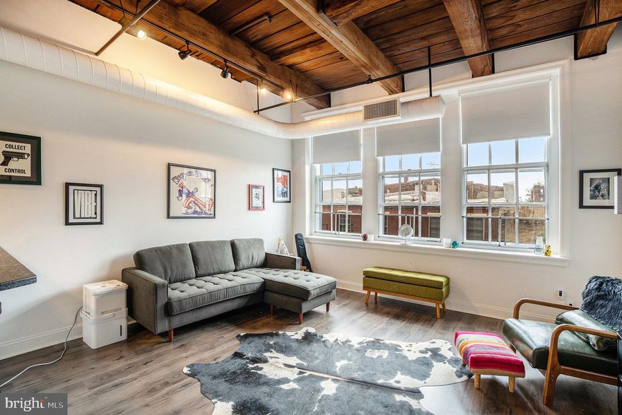 This beautifully renovated condominium could be your new home in the heart of the historic Old City! Located in the architecturally celebrated Wireworks building, this stunning unit blends historic character with modern luxury. The bright, flowing layout features soaring wooden ceilings, exposed beams, oversized windows, recessed lighting, roller shades, and brand-new LVT flooring (2025), offering one of the best views in the building!The chef-inspired kitchen boasts black leathered granite countertops with bar seating, grey shaker cabinetry, subway tile backsplash, and all-new appliances with updated electrical (2025). The bathroom, remodeled in 2022 and refreshed in 2025, includes new fixtures, vanity, lighting, and a modern shower. A full-size in-unit washer and dryer (2025) with warranty adds everyday convenience. Additional upgrades include a new HVAC system (2024) with transferable warranty, whole-home air purifier, Nest thermostat, new water heater and plumbing (2025), and professionally cleaned ducts. Basement storage is included, and monthly parking is available across the street. Enjoy the best of city living just steps from world-famous historic landmarks, premier dining, shopping, art galleries, and public transportation. Located at the crossroads of Old City, Society Hill, and the Delaware River waterfront, this vibrant neighborhood blends historic charm with cosmopolitan energy. Stroll cobblestone streets past Independence Hall, the Liberty Bell, and Elfreth’s Alley; browse 3rd Street boutiques and First Friday galleries; catch a show at FringeArts or the Arden Theatre; or relax at Race Street Pier and Spruce Street Harbor Park. Savor coffee at La Colombe, quick bites at the Bourse Food Hall, green breaks at Washington or Franklin Square, and evenings along 2nd Street’s lively dining and bar scene. With walkable streets, pet-friendly parks, seamless access to the Market-Frankford Line, Indego bikes, major highways, this location combines convenience, character, and an unbeatable city lifestyle. Don’t miss this turnkey residence. Schedule your private showing today!