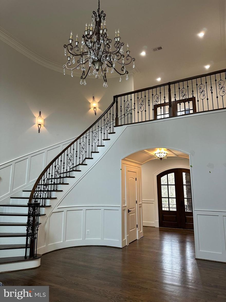 A Rare Custom Estate of Timeless Elegance and Scale

This extraordinary over 10,000-total-square-foot custom-built residence is a masterful blend of architectural craftsmanship, refined luxury, and grand-scale living. Every detail has been thoughtfully curated using premium imported materials, creating a home that is both impressive and enduring.

The home sits on over a half-acre of land and features six expansive bedrooms, a dedicated private office, and six full bathrooms and two half-bathrooms, offering exceptional comfort and functionality for both everyday living and entertaining. 

A magnificent foyer sets the tone upon entry, opening to soaring ceilings, rich imported hardwood floors, an elegant staircase, and statement custom chandeliers that elevate every space.

At the heart of the home is a stunning chef’s kitchen showcasing a massive center island, custom cabinetry, high-end appliances, elegant stone countertops, and designer lighting—perfectly designed for entertaining on any scale. The adjoining open living spaces are filled with natural light and architectural drama, including exposed beams, a striking stone fireplace, and seamless flow throughout.

The lower level offers endless possibilities—ideal for a home theater, gym, wine cellar, or additional living and entertainment spaces. Every level of the home reflects superior construction, refined finishes, and thoughtful design.

Crowned with an imported roof and finished with bespoke details throughout, this residence is a true statement property—crafted for those who value luxury, space, and uncompromising quality.

Completing this remarkable estate is a 4-car garage space (currently enclosed but can be converted back), a wide circular driveway designed for ample parking and ease of access, great balcony views, two fireplaces, and a private backyard ideal for entertaining which offers generous space for outdoor dining, gatherings, and relaxation.

A rare opportunity to own a one-of-a-kind custom estate designed to impress at every turn.

Sold in as-is condition.