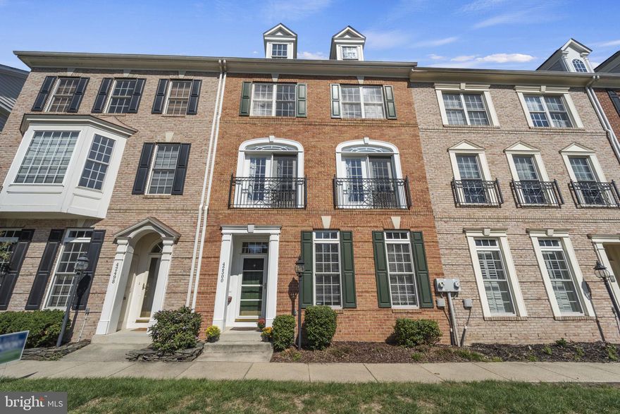 Beautiful 4 bedroom, 2.5 bath brick-front townhouse in the friendly Brambleton community. This home offers over 3,000 square feet across 3 levels and provides comfortable day to day living and an opportunity to host holidays and entertain friends and family. As you enter the home you're greeted by the family room that allows you to lounge and peek out the window at the 12 acre park which lives across the street from your home. The dining room comfortably fits an 8 seater table and transitions to the expansive open kitchen that gives you the option for a secondary living room area and eat in dining area. 

The second floor hosts the primary bedroom with an ensuite bathroom and study area that provides you your own space to retreat and relax inside of your home. On the upper level you'll find two large bedrooms and a full bathroom that make this home great for every home buyer. 

Brambleton has three elementary schools, three middle schools, and three high schools. It also offers endless amenities including pools, tennis courts, basketball courts, parks, miles of jogging/biking trails, tot lots, clubhouse, and several family activities throughout the year. Walk to Brambleton Town Center which has a Movie Theatre, Grocery Store, Shops, Restaurants, and more.