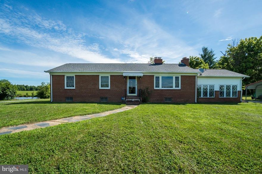 Privacy awaits you! All  brick rambler- situated on 2 acres with pond views and access  Go fishing just steps from your door  Classic hardwood floors boast character on main level.  Full unfinished basement has plenty of room for growth or great storage/workshop area. Roof is less than 2 years old  One car garage/shed is new and has 120 & 240 electric hook ups. Don't miss your chance to enjoy serene living only minutes from 95-