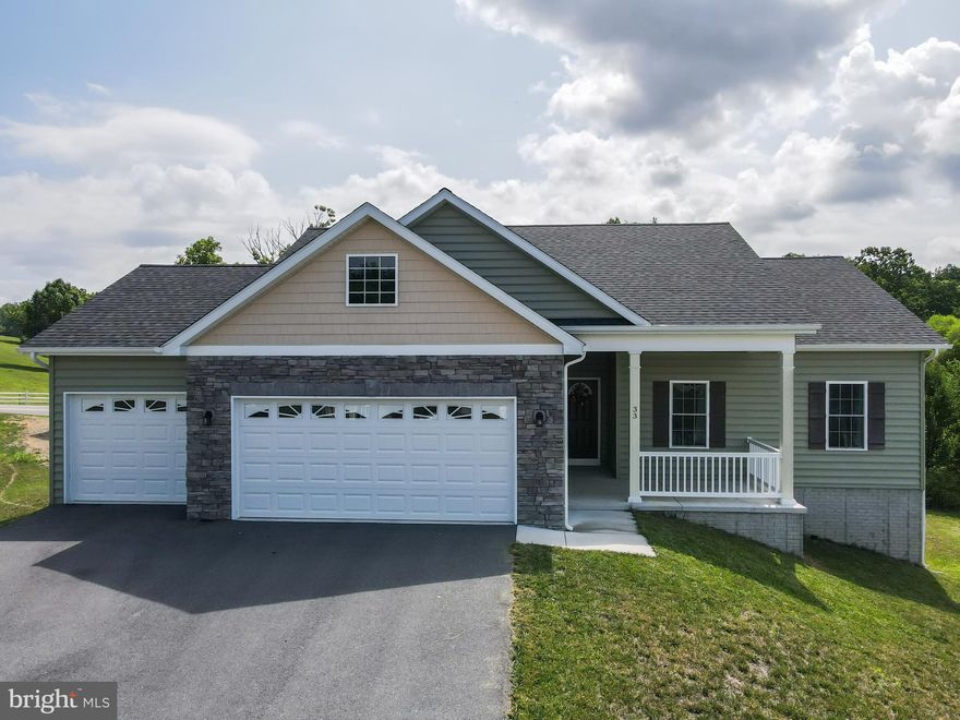 Beautifully maintained 2 year old rancher located Links Place SD. The property sits in a cul de sac.  This 3 Bedroom 3 Full Bathroom home features and open concept with 9 foot ceilings, gourmet kitchen with granite counter tops and stainless steel appliances. The master bedroom has a tray ceiling, walk in closet and the master bedroom has a large soaking tub. Finished walk out basement with a full bathroom. Recently painted deck and 3 car garage. Minutes from Rt 9 for easy commuting.