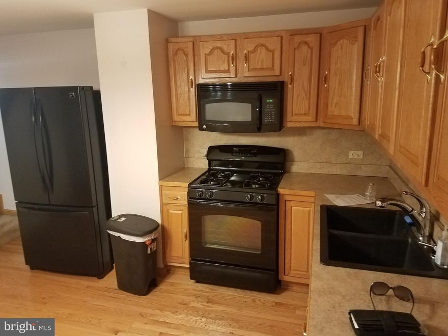 Ready to  Move in and make this Home. Updated Kitchen, Rear Porch, Central AC