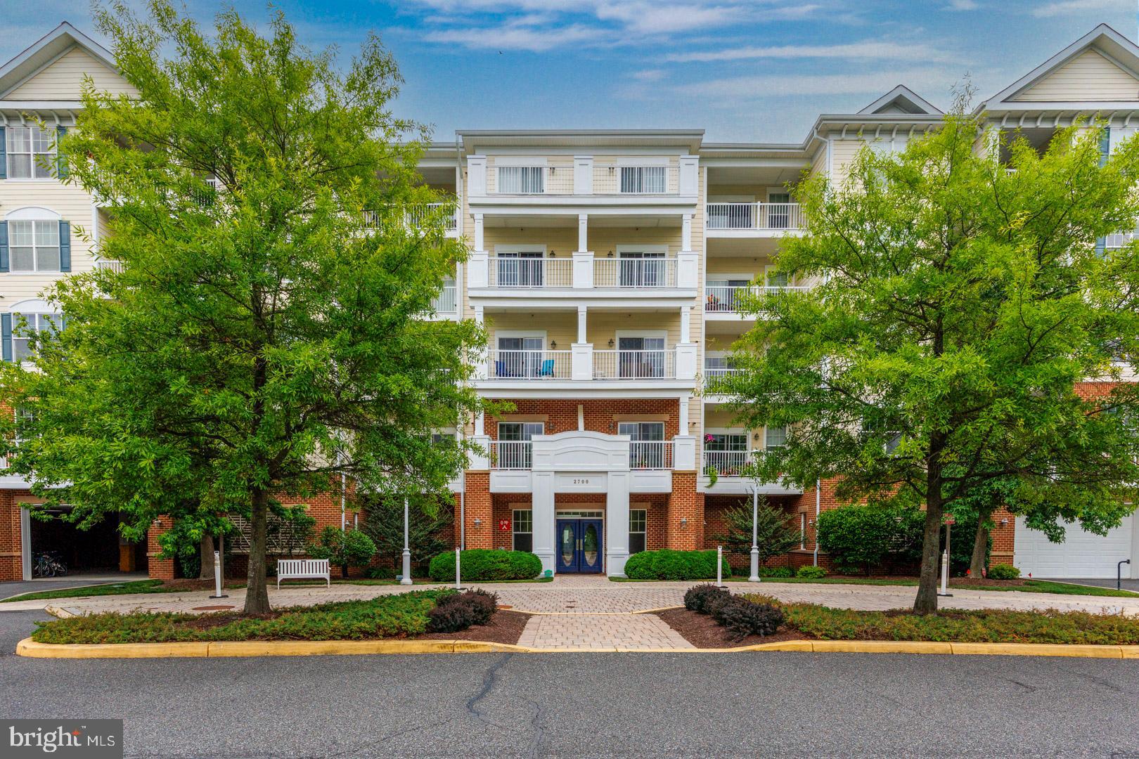 Top Floor Condo next to the Hyatt Regency Chesapeake! Enjoy easy, maintenance-free living in this spacious, fully furnished 2-bedroom condo with water views of Shoal Creek. The building has been recently renovated featuring a furnished lobby and upgraded common areas. There are 2 elevators for convenience. This condo is a perfect vacation home or primary for those looking to downsize and enjoy Eastern Shore Living. Freshly painted, new flooring in living/dining and bedrooms, new primary bathroom vanity. New HVAC in 2024! The well-equipped kitchen offers granite counter tops, stainless steel appliances, a large bar, pantry, and dining space. The living/dining area opens to a large balcony, ideal for relaxing with scenic views. The primary en-suite includes walk-in closet, plus a spa-like bath with dual vanities, soaking tub, and large shower. A private second bedroom and full bath offer guest comfort, while a large laundry room with storage adds convenience.