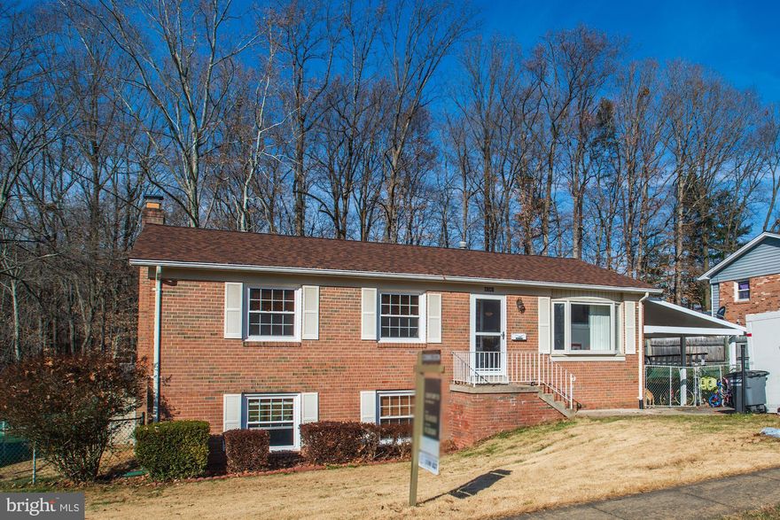 Beautiful, light filled, freshly painted &  well maintained single family home  on cul de sac that backs to trees. No HOA! 5th Bedroom on lower level (not to code). Open floor plan. Stainless steel appliances, granite countertops and ceramic tile. True hardwood floors throughout main level. Huge fully fenced yard backing to the woods for privacy and a view. Ample storage and shed. Covered porch just renovated. Roof is 2 years new. Carport & driveway for parking.