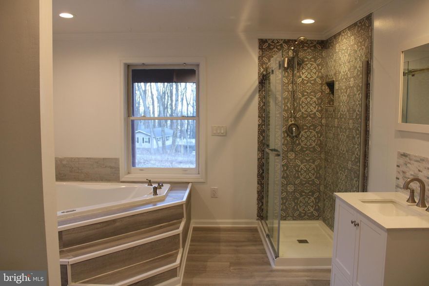 Gorgeous home situated on a spacious 0.62-acre lot in the highly sought-after Blue Mountain area! This beautifully updated property features upgraded appliances throughout, along with a roof approximately 10 years old for added peace of mind. The main level offers 3 generously sized bedrooms and 2 fully renovated bathrooms, complemented by new flooring, fresh paint, and modern finishes throughout. Step outside onto the expansive wrap-around deck—perfect for relaxing or entertaining while enjoying serene, scenic views. The walkout lower level adds exceptional versatility and includes a luxurious full bathroom, along with a brand-new washer and dryer for your convenience. Ideally located just minutes from I-66, the Shenandoah River, and the Appalachian Trail, this home combines comfort, style, and accessibility.
A true must-see!