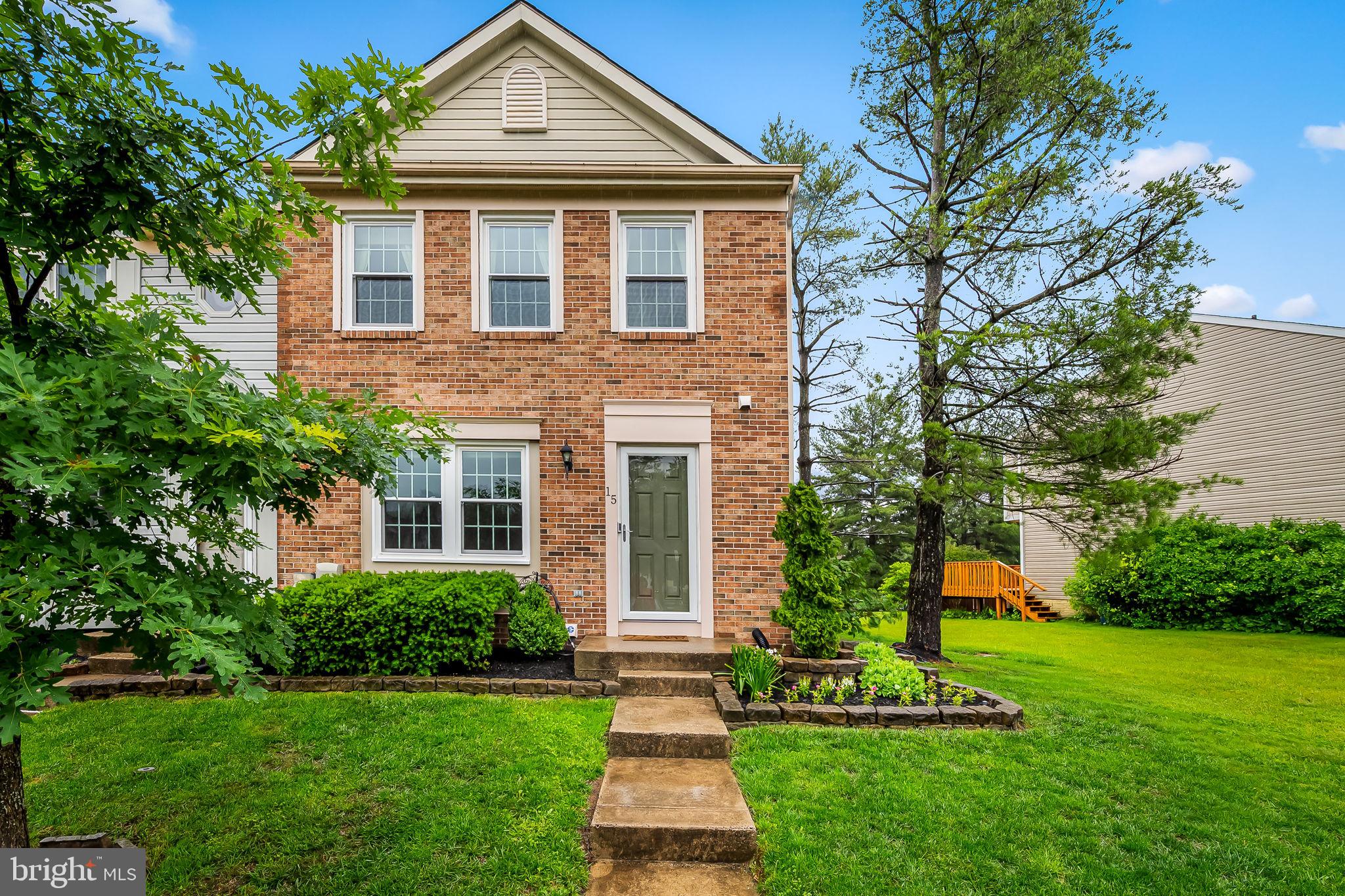 The M Group of Long and Foster is pleased to present 15 Margery Court. This charming brick front end of group townhome is perfectly situated in the desirable Nottingham community and features three bedrooms and one and half bathrooms. From the moment you arrive, you'll be impressed by the great curb appeal, with its well maintained exterior and landscaped front yard that creates a warm and inviting first impression. Inside, the main level features laminate flooring, an updated kitchen with granite countertops, tile backsplash and stainless steel appliances. The adjacent dining room opens to a large deck and a fully fenced yard with fire pit, perfect for relaxing or entertaining. The second level features three spacious bedrooms and an updated full bathroom with dual vanities. Additional highlights include new windows throughout and a full basement with rough-in. Conveniently located near shopping and dining. This move-in ready home is ready for its new owners. Make it yours today!