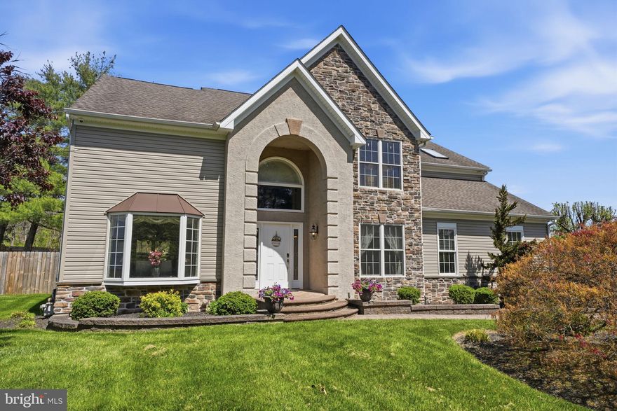 Set within Heatons Mill suburban neighborhood, this elegant traditional residence offers a harmonious blend of classic architecture and modern comforts. The main level is highlighted by dramatic vaulted ceilings, creating a grand yet inviting atmosphere. A well-appointed gourmet kitchen anchors this home, with an island center, abundant cabinetry and counterspace that flows effortlessly into the adjoining great room with a  custom stone fireplace as a focal point and built-in surround speakers- creating an ideal setting for movie nights. A dedicated study provides the perfect work-from-home space or a quiet place to read.  Upstairs hosts the generously sized primary suite- a luxurious private escape, inclusive of a sun filled ensuite to soak all your troubles away. The loft bedroom is a unique and versatile space- that can serve as a guest bedroom, office or additional lounge. The lower level enhances the home’s versatility with additional space for entertainment,  an at-home fitness room, or guest quarters. Step outside, to a multi-leveled covered deck with built in speakers to serenade you, a hot tub for ultimate relaxation, and a firepit to keep you warm on brisk nights. This outdoor space creates a serene retreat, ideal for both lively gatherings and peaceful evenings. Smart home enhancements- including a digital thermostat, garage door entry,  keyless door locks and security system. Every element of this home is designed to support a relaxed and elevated lifestyle!