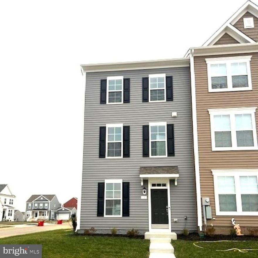 The only community within historic Charles Town with resort style amenities! 
**Cover Your Closing Cost Up To $15,000, Paid by DRB Homes and Lender Credit for Primary Residence with Use Of approved Lender and Title!**
 Brand New Construction Available in Jefferson County’s premier planned community. This End Unit 3 Bedroom, 3.5 Bath, spacious foyer, and a double coat closet, upon entering. The bottom level includes a room which could b e used as an office/study or 4th bedroom, a full bathroom and rec room! The second level is an open concept oversized kitchen with a large island, stainless steel appliances, upgraded cabinets, Quartz countertops, backsplash, luxury vinyl plank on entire level, and it opens to the morning room and living room. This home features our alternate main floor option, which truly creates an open concept from the front of the home to the back. The primary suite features a large walk-in closet, dual vanity, and a large separate shower. Laundry is located on the bedroom level. The home is complete with a private 2 car rear parking pad.