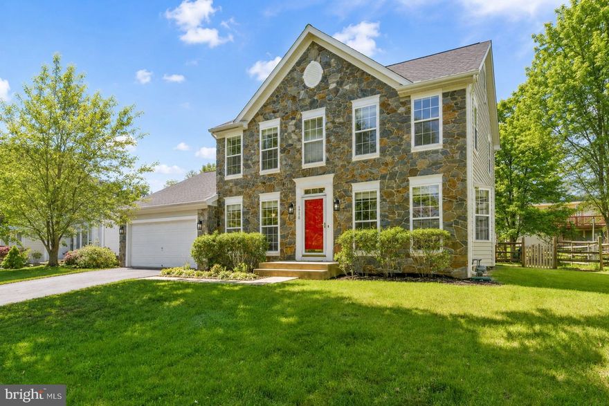 Check out this stately colonial home located in the sought after, Dearhought neighborhood.  This home blends the best of classic charm with modern touches.  The home's charm is clear as you prepare to enter and take advantage of one of the few, stone front homes in the area.   The main level provides gleaming hardwoods and mix of open floorplan with the large kitchen that looks into the great room; along with formal spaces in the dining room and living room.  The upper level offers four large bedrooms (all with new carpet) that are led by the luxurious primary suite. The owner's suite offers cathedral ceilings, two large walk-in closets, and a large on-suite bathroom. This bathroom includes a double vanity, a soaking tub, and a spacious shower. The lower provides extra living space with a large living area, a full bath, and a great storage/workshop/craft room.  The exterior provides a serene backyard that can be accessed by the updated deck that comes off of the kitchen and the great room.   This neighborhood offers a quiet and calm surrounding as you enjoy the sidewalks that will connect to walking/bike trials that provide miles of enjoyment running past the Monocacy River.  Access to the large community pool, tennis courts, and playgrounds are a bonus! Easy access to shopping, dining, Wegman's Grocery Store, and major commuter routes.