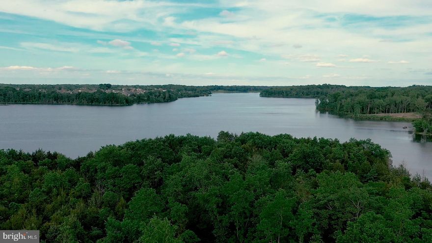 Price adjustment the property is getting split in two 10 acre parcels.   Once split each 10 acre parcel is $550,000.  Amazing opportunity to own Lake Front property.  Lot is able to subdivide into two lots.  NO HOA or Covenants.  Beautiful view and property has large frontage on the inlet and main lake view.  Perfect for a large estate or split for two potential estate lots.