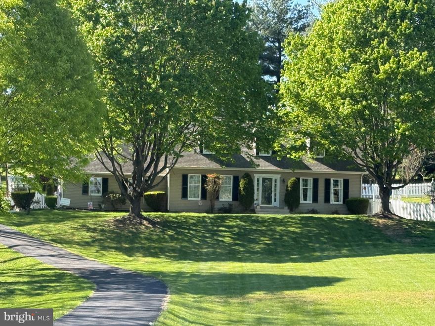Beautifully set on 1.5 acres, this charming Cape Cod-style home offers the perfect blend of timeless character and modern updates, featuring 3 bedrooms and 3 full baths.
     The main level showcases gleaming hardwood floors, ceramic tile, and a thoughtfully updated gourmet eat-in kitchen—ideal for both everyday living and entertaining. A versatile family room with a cozy fireplace can easily serve as a main-level office, complemented by separate formal living and dining rooms. A spacious full bath with a walk-in shower conveniently incorporates the main-level laundry.
     Upstairs, you’ll find three generously sized bedrooms and two full bathrooms, all accented by hardwood flooring, ample walk-in closets, and a well-appointed primary suite.
     The finished walk-out basement expands your living space with an expansive family room and great room, complete with a bar area and pellet stove—perfect for gatherings year-round.
     Step outside to enjoy the fully fenced backyard oasis featuring a large covered porch, patio, and a 9-foot in-ground pool surrounded by extensive landscaping. Additional highlights include a two-car garage and an outbuilding for extra storage or workspace.
     Golf enthusiasts will appreciate the prime location directly across from Bowling Green Golf Club and just minutes from Shenandoah Valley Golf Club.
     This exceptional property truly has it all—space, comfort, and location.