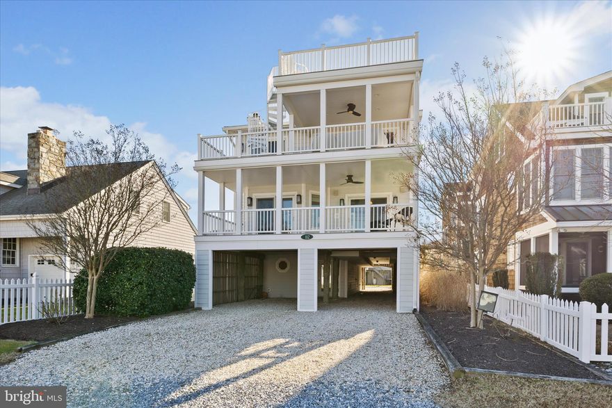 This custom built home with a fantastic rental history is located just a 1/2 block to the beach.  Enjoy the open floor plan with several  living areas, two fire places, a wet bar, large kitchen with new stainless steel appliances,  decks on every level including a screened porch.   The Maplewood Street location is perfect as it offers close proximity to the beach, shops and restaurants in downtown Bethany.