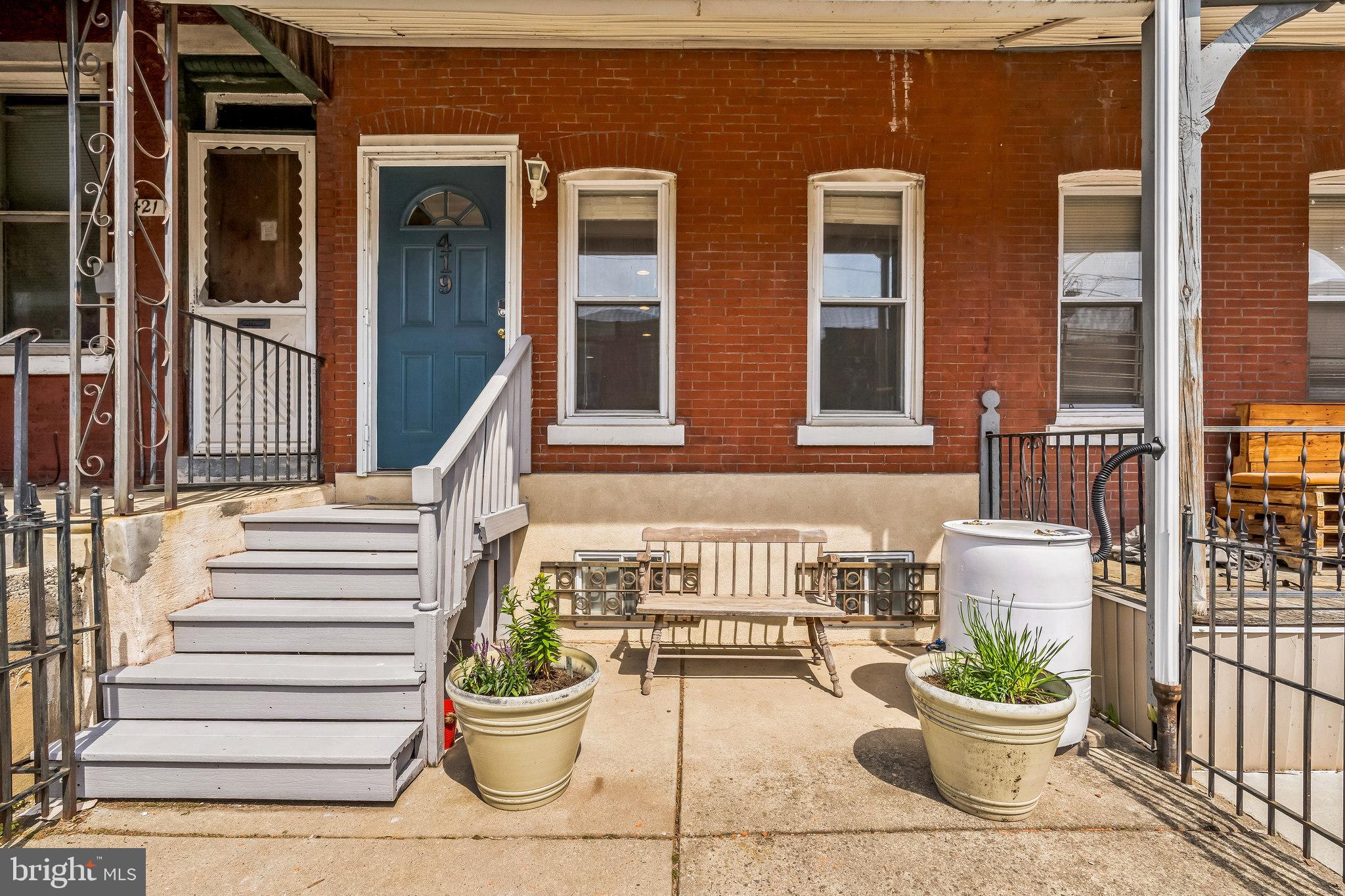 Welcome to this inviting porchfront home in the heart of West Powelton, where thoughtful design and everyday comfort come together. The main floor features a unique and flexible layout, starting with a spacious entryway with hardwood floors that flow seamlessly throughout the home. A designated dining area sits perfectly between the entry and a generously sized living room — ideal for your sectional and TV, with no glare from the front windows.
Toward the rear, you’ll find a well-placed powder room and an eat-in kitchen equipped with stainless steel appliances, granite countertops, wood cabinetry, and space for a small island. A large window fills the kitchen with natural light and the back door leads out to the serene back patio — a perfect spot to relax or cultivate your urban garden. A convenient side alley provides discreet storage for tools and trash bins.
Upstairs, the second floor offers three bedrooms with large windows and recessed lighting. The front two bedrooms share a modern, hall bathroom featuring a soaking tub with tile wall surround. The third bedroom is the primary suite, featuring a sunny bedroom and a private, well-appointed bathroom with frosted window for privacy. The finished basement provides additional space for a home gym and/or game room along with storage space and a full size washer and dryer.
This home is ideally located with easy access to University City, UPenn, Drexel, trolley lines, grocery stores, and beloved local spots like Asad’s Hot Chicken and Dim Sum House. A rare combination of charm, functionality, and location — come see it for yourself!