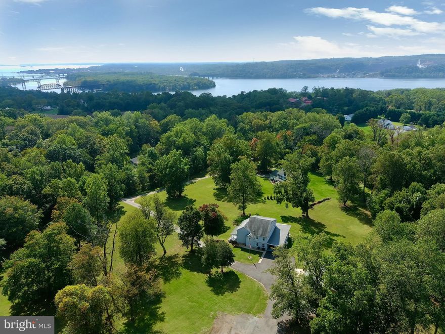 Rarely available farmhouse, built in the 1800's, has approximately 2700 finished sq.ft.  and is completely remodeled. Situated on 11 pristine acres!!! Property is mostly cleared, level and  surrounded by woods.  Perfect property for horses, livestock and hunting. Detached, oversized 40 x 30' garage with workshop recently added  along with huge paved, parking pad.  Rear of home has unbelievable 44'x16 covered porch along with 40'x9' covered side porch. 24" x 14' country kitchen has new ceramic tile floor, oak cabinets, stainless steel appliances and washer & dryer closet. Living room and dining room have new, wide plank, luxury vinyl wood floors. Family room has exposed beam ceiling. Sitting room on main level could possibly be 4th bedroom too. Bathroom has been remodeled with stunning double vanity, tile floor and tub/shower with tile surround. 3 large bedrooms on 2nd floor remodeled with new flooring, built in cabinets and closets. 2nd level also has large 16,x13' sunken family room. Home has two cellars and 200+ amp electric service. Home is heated by oil furnace with hot water baseboard. Home also just had installed 3 mini splits for AC and supplemental heat. Plenty of space for riding ring, barns and fencing if desired with abundant pasture. Deer are also very plentiful on the property. This property is private, peaceful and very special. Only minutes from 1-95, Rte. 40 and Marc Train. Under 20 minutes to APG. Property is spectacular with so much potential!!!