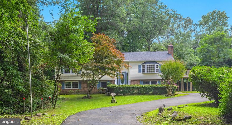 Presenting 3614 King Dr in Regal Estates, this home truly embodies the saying "Location, Location, Location!" Situated at the northernmost part of Calvert County, it offers convenient access to all amenities, with Town Center Blvd's shopping and restaurants just a five-minute drive away. Not to mention, it provides quick and easy commuting options to Annapolis, DC, Northern Virginia, and several other routes.

Nestled on a spacious 1.06-acre lot, this property boasts a picturesque wooded park-like setting, complemented by a large level side yard that grants privacy, slightly set back from a peaceful cul-de-sac via a tree lined driveway. This meticulously maintained split foyer offers five generously sized bedrooms, three full baths, and a fully finished lower level with an abundance of storage.

Step inside, and you will find a delightful eat-in kitchen with ample room, adorned with updated white cabinets and Corian countertops, flowing seamlessly into the dining room. The family room is a bright and inviting space, featuring hardwood floors, loads of natural light, and a cozy corner fireplace, perfect for those winter evenings with the convenience of a gas log set.

On the main level, two guest bedrooms share a full bath, while the primary bedroom comes with an ensuite bath for added convenience. The walkout lower level impresses with its abundance of natural light, hosting a second family room with a wood-burning stove, as well as two additional spacious bedrooms, another full bath, a laundry room, and ample storage.

A screened-in porch offers a delightful spot to enjoy the shade and connect with the outdoors where you can also enjoy the adjacent deck that has a staircase which leads to the back yard and a well-appointed shed with electric provide ample space for projects and storage.

In summary, this property presents an excellent opportunity to own a move in ready, beautifully maintained and spacious home, offering both serenity and accessibility in a sought-after location.