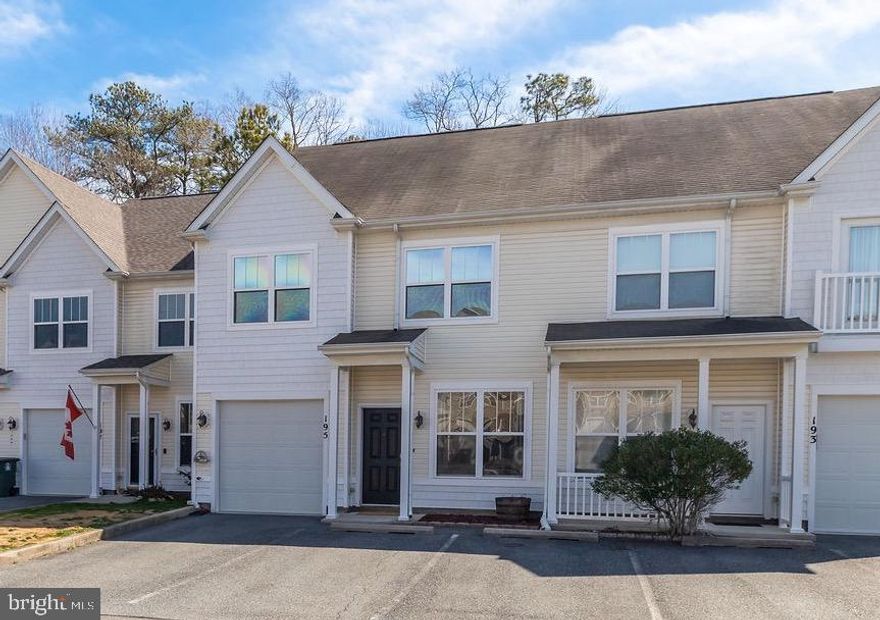 Move-in ready townhome in the popular Decatur Farm community! Enjoy the best of coastal living with a short drive to Ocean City’s beaches, Assateague Island, and a quick walk to historic downtown Berlin, where you’ll find charming shops, dining, and year-round activities. This 3 bedroom townhome features luxury vinyl plank flooring throughout (except for one bedroom), offering both style and durability. The first floor includes a spacious living area, a bright kitchen, and a versatile bonus space that can be used as a home office, dining area, or cozy sitting nook and a coat closet. The kitchen leads to a private backyard with a paver patio and privacy fence—perfect for entertaining, relaxing, or giving kids and pets a safe place to play. A convenient half bath is also located on the first floor. Upstairs, the primary suite features a walk-in closet and an en-suite bath with an oversized vanity. Two additional bedrooms—one with its own walk-in closet—share a full hall bath. A second-floor laundry room adds extra convenience and there is also a linen closet. Parking is easy with an attached one-car garage, two spaces in front, and additional guest parking nearby. Decatur Farms offers fantastic amenities, including a pool, clubhouse, fitness center, and playground.  Stephen Decatur Park, located just across the street, features tennis and pickleball courts, a disc golf course, walking trails, and a playground. This townhome truly has it all—location, comfort, and community amenities! Don’t miss your chance to own this wonderful home.