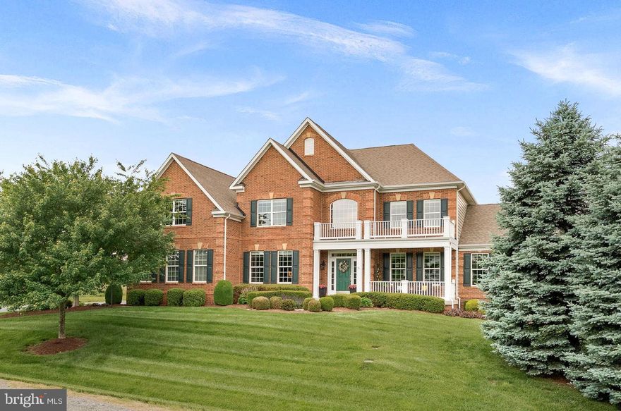 Welcome to this luxury estate home located in the sought-after Evergreen Reserve  community.  This refined residence is a testament to modern elegance, nestled on just over 1 private acre within a scenic setting and designed for luxurious living and entertainment.

Offering over 7,200 square feet of bright and airy living space across three levels, this home is an entertainer's oasis both inside and out.  This home is equipped with energy-efficient features, including a solar panel system (fully paid) that provides complete grid-independence from the local power company.  

With five spacious bedrooms and four and a half meticulously designed bathrooms, this residence offers ample room for relaxation and comfort. Hardwood floors, carpet, ceramic, and LVP flooring adorn the interiors, and a double staircase adds to the architectural charm. The primary ensuite bathroom has been recently renovated to exude luxury, featuring a standing tub, a walk-in shower, and dual vanities. Additionally, a versatile bonus room above the garage provides extra space for a variety of uses, from a playroom to a guest suite or hobby area.

The focal point of the main level is the chef's kitchen, a culinary delight equipped with top of the line appliances including a 48” dual fuel professional range with 6 burners and a griddle, a convenient pot filler, an under counter microwave, a wine fridge, and butler’s pantry/coffee bar. This open-concept space includes a large island and eat-in area, connecting to the formal dining room and family room with a natural gas fireplace, perfect for entertaining.  

Additional luxuries include a sunlit conservatory, a cozy library with built-in bookcase and storage, and a finished lower level with a wet bar, exercise area, and a state-of-the-art sound-proofed home theater with a 110-inch screen, motorized recliners, and 7.2 surround sound.   The conservatory is currently used as a home office but it can easily be converted into a main level bedroom.  Modern comforts such as a 3-zone central heating/cooling, each controlled by wi-fi enabled auto-thermostats, ensure climate control comfort throughout the seasons.  Your indoor comfort is significantly improved by the application of UV film on all windows, effectively blocking harmful UV rays and reducing the fading and sun damage to carpets and furniture.  A Tesla wall charger within the 3-car garage conveys with the property, adding to its modern conveniences.

The outdoor amenities are equally impressive, including a fully landscaped front and rear yard.  In addition, the backyard features a covered slate patio with a large stunning stone fireplace and retractable sunshades, and an outdoor kitchen ideal for alfresco dining and entertaining.  Beyond the patio, the large back lawn is ideal for a future swimming pool and/or putting green.  A 16-zone in-ground sprinkler system keeps your entire lawn and landscaping well maintained.  

Experience luxury and tranquility in a location that is both scenic and conveniently accessible, making it the perfect home for those seeking the ultimate in modern living.  Wonderful school zone with Independence High, Brambleton Middle & Sycolin Creek Elementary. Just a few miles from Brambleton Town Center, Beaverdam Reservoir, Fleetwood Winery, Hartwood Winery, Brambleton golf course and the Metro Silver Line Loudoun Station!

Seller/Listing Agent is a Virginia Licensed Realtor.  Seller would like to sell most of the furnitures.