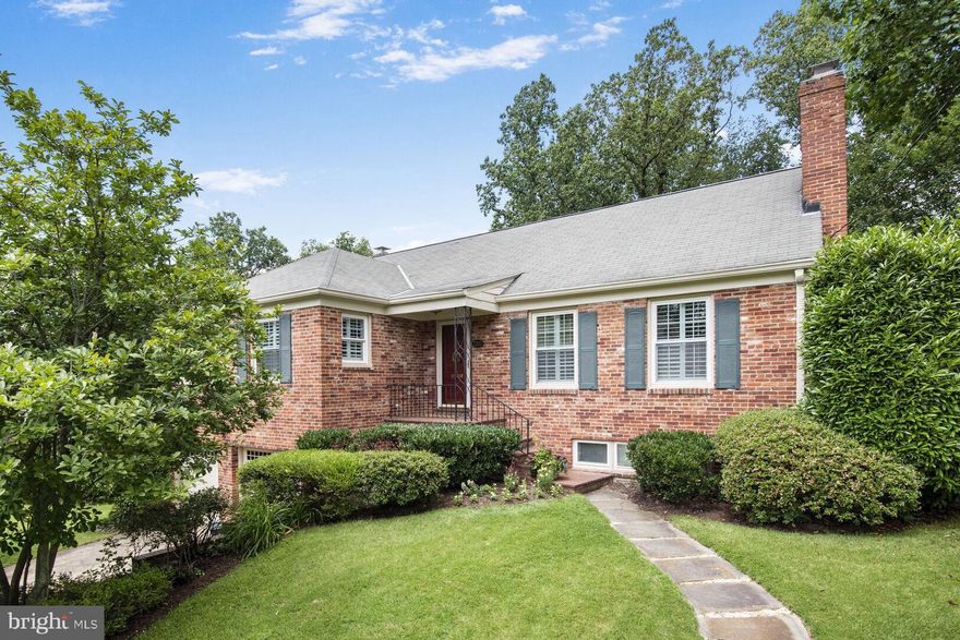 Home Sweet Home! Welcome to 7205 Radnor Road, where charm meets convenience! Enjoy the professionally designed kitchen with island seating for five—a perfect space for entertaining and daily living.

The inviting living room is bathed in sunlight and features a wood-burning fireplace, custom built-ins, and large windows dressed in plantation shutters. The main level hosts three bedrooms, including a primary suite with an ensuite bath and ample closet space. Two additional generously sized bedrooms share a well-appointed hall bath.

The upper level is a large unfinished attic with walk up stairs, providing storage galore! Step outside to the screened porch overlooking a large, flat backyard. The property also includes a spacious two-car garage with plenty of room for vehicles and storage.

The walk-out lower level offers versatile space for recreation and includes a large home office (currently being used as a bedroom). Recent updates throughout the home include updated lighting, new carpet on the lower level, a new stair runner, a new hot water heater, new garage doors with automatic openers, and new windows for the main level and bonus room (slated for installation within the next few weeks).

Nestled on a gorgeous lot of nearly 12,000 square feet, the property features mature landscaping and specimen trees, including Kwanzan Cherry, Jane Magnolia, Star Dogwood, and Red Maple. Although the legal description lists Bradley Hills, this home and its neighboring properties are located in the desirable Kenwood Park neighborhood and are part of the Kenwood Park Citizens Association (membership optional).

Enjoy the convenience of being close to all that Downtown Bethesda has to offer. Be sure to check out the walking path providing a shortcut to Bethesda Row. The home is just a few blocks from Whitman High School and Pyle Middle School and offers easy access to major commuter routes.