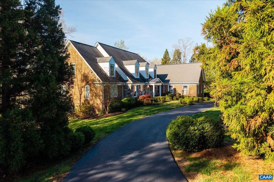 Located in a desirable section of Glenmore Country Club known for its generous homesites, this beautifully maintained custom residence by master builder Randy Rinehart (circa 2006) offers timeless design and exceptional livability. An open, light-filled main level features a well-appointed kitchen and breakfast area that flow seamlessly into the great room, where large windows and doors connect to covered and open rear porches and decks - ideal for entertaining and everyday living. The main-level primary suite provides a spacious and private retreat, complemented by a home office, oversized laundry, and three-car garage. Upstairs, three bedrooms, two full baths, and a versatile bonus room offer flexibility for family or guests. The finished terrace level expands the living space with a recreation room, fifth bedroom and full bath, craft or hobby room, utility space, and ample storage. A thoughtfully designed home offering comfort, flexibility, and enduring quality in one of Glenmore?s most appealing settings.,Cherry Cabinets,Glass Front Cabinets,Fireplace in Family Room,Fireplace in Great Room