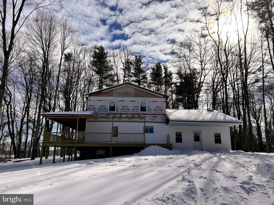 Nearly new home on 33 acres with large rooms and even more room to grow! Metal roof for efficiency on all the buildings. Outside you will enjoy the gorgeous views of mountains and fields from the wide wrap around porch. Perfect property to begin your homestead with a new 2 story barn with several stalls and feed area measuring 36x50 foot. Garage with open floor for shop or equipment measuring 36x70 foot