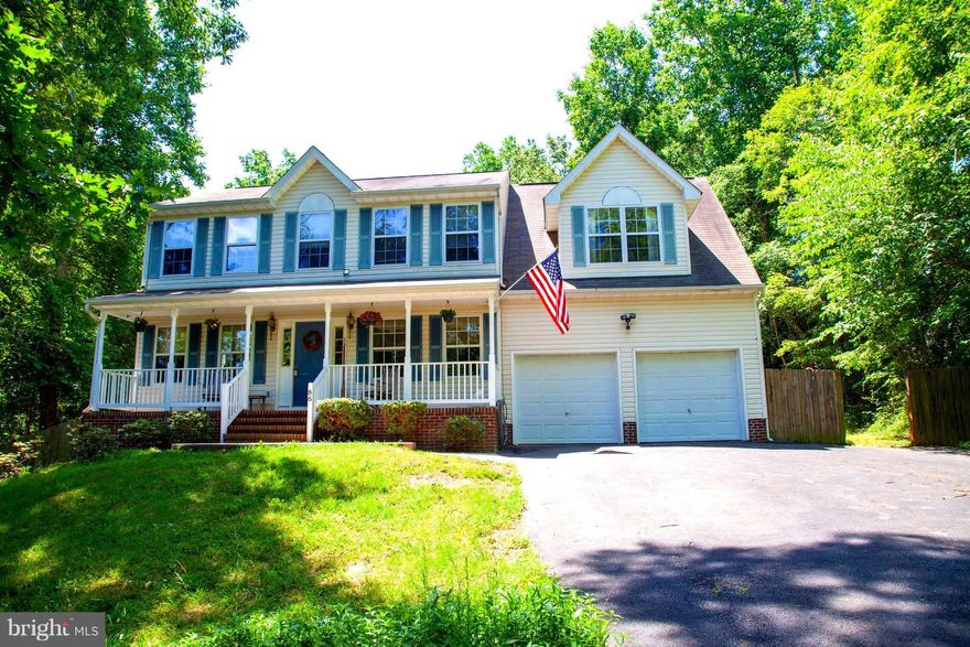 Quiet neighborhood close to great schools & shopping. 3 private, wooded acres, with stocked pond across the road. 4 bedrooms, 2.5 baths, separate living and dining rooms plus family room with fireplace. Huge master suit with sitting area overlooking trees. Unfinished walkout basement and 2 car attached garage. Wonderful yard space, small creek w/ bridge & backyard w/ large fenced in gardening area