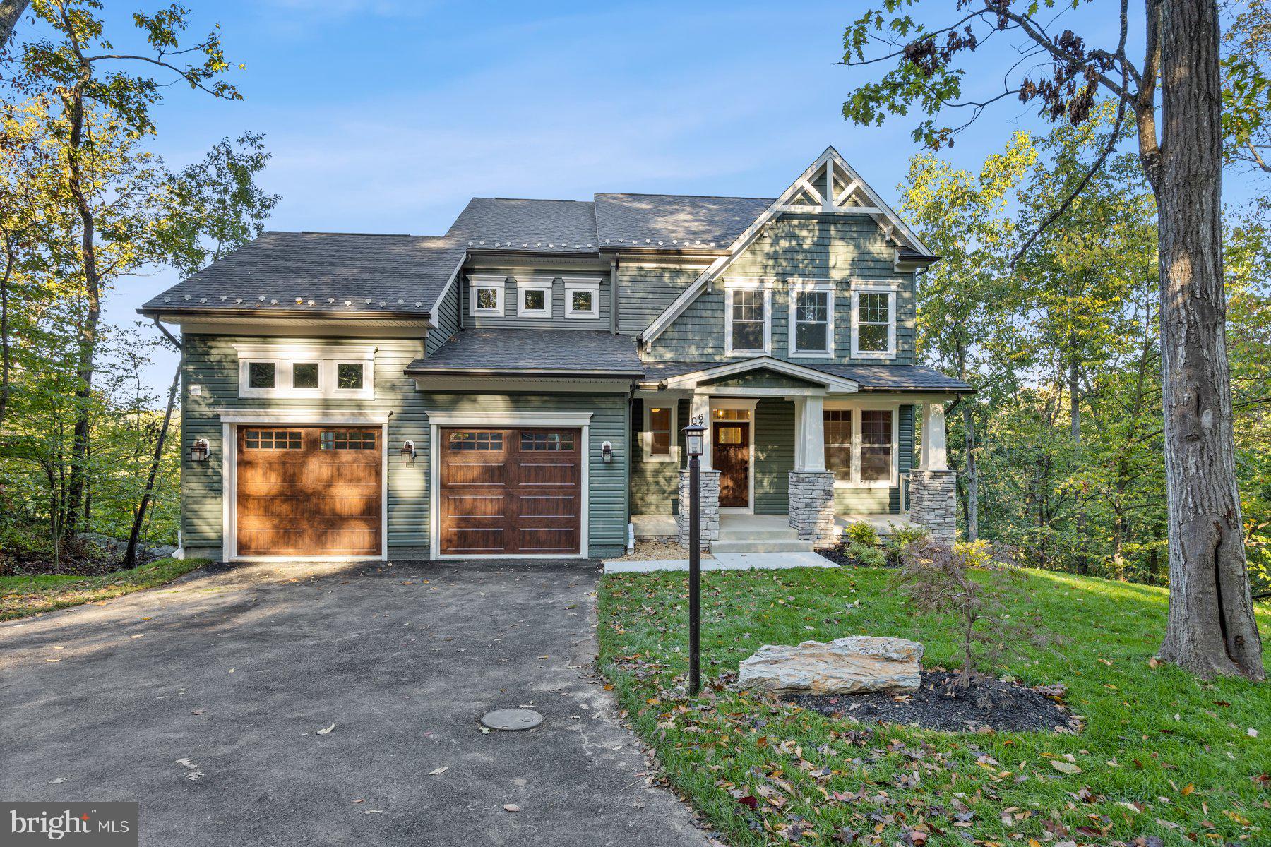 HOME TO BE BUILT. Build this beautiful, custom home, modify to suit your needs or build something completely different. You decide. This model is the Ridge III and features an exterior that is perfectly suited for living and encompassing so many outdoor activities in Lake Linganore. The home's forest green siding is contrasted by crisp herringbone and bronze accents, Hamilton Ledgestone, and dark oak finishes, creating a modern yet calming curbside appeal. Featuring five bedrooms with three and a half baths, this almost 3,000 square foot home includes a home office, mudroom, and generous open first-floor living that includes the kitchen, breakfast, and family room. With a corner fireplace and outdoor living in the screened porch and rear deck, this first floor offers versatility and beautiful spaces to gather with family and friends, or just simply enjoy at the end of the day, Upstairs, the owner's suite features a large en-suite bathroom and walk-in closet, with three additional bedrooms. The finished basement provides and additional bedroom, bathroom, and rec room - giving ample options and extra living space. Please note this home shows a completed screened-in deck and basement (with bedroom and full bath). These options are not reflected in the list price. You could build this model, modify it to suite your needs or bring another plan. Enjoy the incredible Linganore lifestyle with Deep Navigable lake, 3 sandy beached, 3 pools (4th one being built), boating, fishing, swimming, tennis, basketball, beach volleyball, nature & bike trails, Frisbee golf, pickle-ball, Event Tent, Farmers Markets, Summer Concert Series under the stars, playgrounds and so much more ... Come and see for yourself. *Pictures are representative of model / finishes of home in this price range*