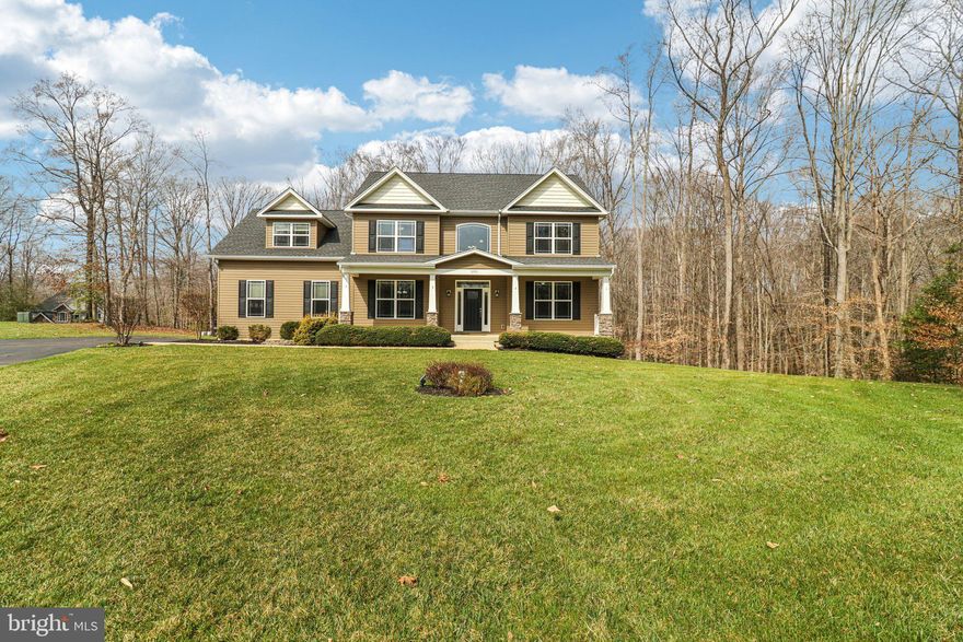 Custom home on acreage in Hollybrook Farm. Tucked away on three private acres at the end of a peaceful cul-de-sac, this pristine Litz Custom Home offers the space, craftsmanship, and setting buyers are always hoping to find. Litz homes are known for their quality construction and thoughtful design, and this property showcases that reputation beautifully. The welcoming front porch invites you to slow down and enjoy the surrounding nature before stepping inside to a two-story foyer with gleaming Cameroon timber floors, one of the hardest woods on the planet and best protection from scratches from pets or high traffic. The foyer opens to formal living and dining rooms with 9-foot ceilings, creating an elegant space for entertaining while still feeling warm and comfortable for everyday living. The kitchen is designed for gathering, featuring upgraded countertops, stainless steel appliances, abundant cabinetry, and a sunny breakfast area. Just off the kitchen, the family room offers a gas fireplace and surround sound with large windows bringing natural light into the heart of the home. In 2021, the owners expanded the living space with a composite deck and a stunning 14×14 sunroom, creating a seamless connection between indoor comfort and outdoor living. Whether it’s morning coffee, quiet evenings, or hosting friends, this space quickly becomes a favorite. Upstairs, you’ll find four spacious bedrooms, including an owner’s suite with tray ceiling and rope lighting. The owner’s bath features a large walk-in shower, centric soaking tub, and dual sinks, creating a comfortable retreat at the end of the day. On the opposite side of the level, the bonus room over the garage provides incredible flexibility and could easily function as a second owner’s suite, guest retreat, or private office, with convenient access to the full hall bathroom. The finished basement adds even more living space, offering a large recreation area, a full bathroom, room for an additional bedroom if desired, and a custom dedicated dog-washing station that pet lovers will appreciate. Additional highlights include gas on-demand hot water, a front and backyard irrigation system, and a 16×24 two-level shed with electricity and 200-amp service, plus a lean-to for tractor or equipment storage. With abundant storage and thoughtful features throughout such as the "Christmas Lights" upgrade offering specializes electrical access for seasonal/holiday lighting and water/electric on the rear deck, this property offers both functionality and charm. Located close to schools, shopping, and major commuting routes, Hollybrook Farm offers the privacy of acreage living while still being convenient to everything you need.