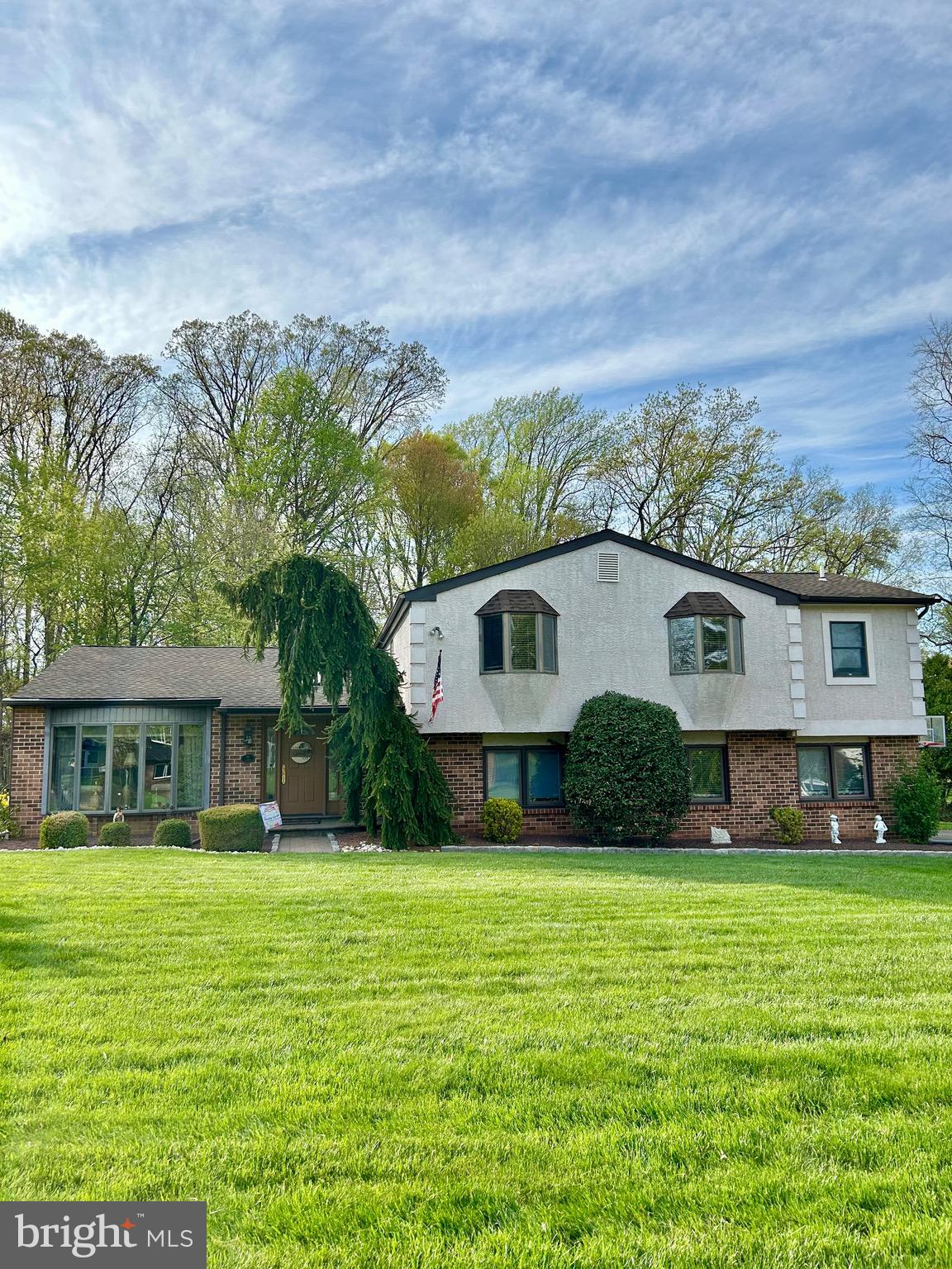 Welcome to this beautiful 4 bedrooms and 3 and 1/2 baths, Split-Level home located in the desirable neighborhood of Deerfield North, in Richboro.
A paved walkway and beautiful landscape welcomes you to this amazing home. As you enter there is a coat closet followed by a set of french glass doors into the Formal Living and Dining rooms.
On the main level you will also find a modern Kitchen with Stainless Steel Appliances, granite countertops ceramic tile backsplash and a good size eating area with picture window overlooking the beautiful back yard and outside deck. A couple steps down from the Kitchen is a Family Room, with a wood burning enclosed fireplace. On this level there is also a 1/2 bath and a large office space, Laundry Room and access to a 2 car garage. The second floor features hardwood flooring, a Primary Bedroom with lots of closet space and a huge private bathroom with a double sink vanity, jacuzzi tub, shower and linen closet. The rest of the upper level offers 3 good size bedrooms and 2 full baths with heated floors. On the lower level you will find a nice finished basement great for exercising, playroom or just for additional living space. Great outside space with cement patio, grilling area and deck, perfect for entertaining family and friends. Don't pass up this opportunity to live in this Northampton Township Community with the highly rated, award winning Council Rock School District. Make your appointment today.
