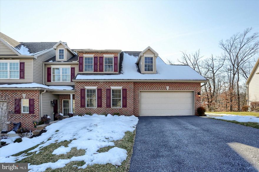 Welcome to 284 Red Haven Road, nestled in the rolling hillside of Olde Orchard Hill, New Cumberland.  This  Yingst built highly sought-after, end unit town home was the former Model home.  The Orchard III floor plan features over 2100 square feet of living space with 3 bedrooms, 2.5 bath with over 2100 square feet of living space, with the primary suite and laundry conveniently located on the first floor.  This meticulously maintained property features an open concept floor plan with vaulted ceilings and tons of natural light throughout.  The heart of the home, the kitchen, has new quartz countertops, under mount Kraus sink & faucet, new whirlpool appliances including a gas range as well as an over sized island and beautiful wood floors.  The kitchen also features a sizeable dining area and overlooks the spacious living room, great for entertaining or enjoying your morning coffee.  Two additional bedrooms, full bath and a loft finish off the second floor.  Designed for effortless maintenance the prime location offer convenient access to I83 and major highways.  Don't miss your opportunity to own this amazing property!