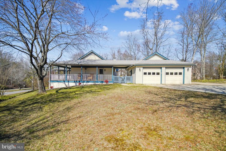 Welcome to this charming 3br/2ba meticulously maintained single-story home on a spacious corner lot (with 3% VA assumable loan)!  Step onto the new composite wrap-around front porch and imagine sipping your morning coffee while enjoying the tranquil surroundings.  The updated kitchen with granite countertops, stainless steel appliances, coffee bar, and sitting area provides plenty of space and cooking inspiration.  The kitchen opens up to the living room with an updated gas fireplace, as well as a separate formal dining room.  You’ll enjoy the oversized bonus room which provides plenty of room for a home office and additional living space.  Oh, and did we mention the amazing Patagonian Rosewood flooring throughout the home?  This home also boasts a generous two-car garage and an oversize walk-up attic.  The garage is perfect for additional storage or workshop space and is connected to the main home by a breezeway.  This home offers plenty of space for relaxation and entertainment.  You’ll also love the large and fully fenced back yard.  HVAC replaced in 2022.  Located in the heart of La Plata, this home is close to local shops, restaurants, and entertainment.  Commuters will love the easy access to Washington, DC, Joint Base Andrews, and Coast Guard Headquarters.