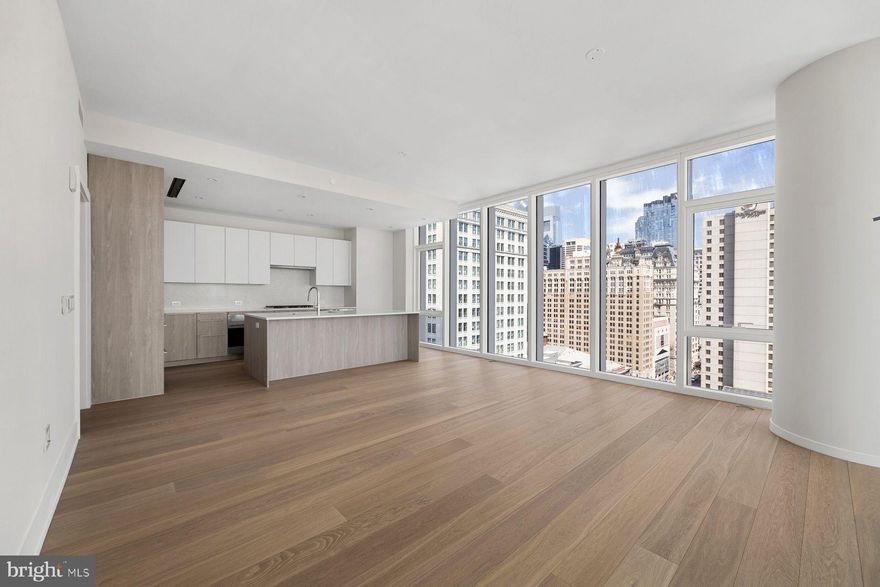 Experience refined modern living at  Arthaus - Philadelphia's premier luxury tower on the Avenue of the Arts. Welcome to Unit 1902 - an impeccably designed two-bedroom residence which pairs architectural elegance with effortless luxury. Enjoy an expansive open living and dining area with floor to ceiling windows and access onto your private balcony offering dramatic city views. Throughout the interior a stunning white and silver ash palette paired with Fendi floors creates a sleek, designer foundation - the perfect canvas for layering in your own elevated style.  Arthaus has world-class amenities; everything you could imagine from a 75 ft indoor lap pool to a sky garden, a dog run & spa, 24-hour concierge, chauffeur-driven town car and so much more. Your purchase includes 1 parking license for valet parking, and a 10 year tax abatement.