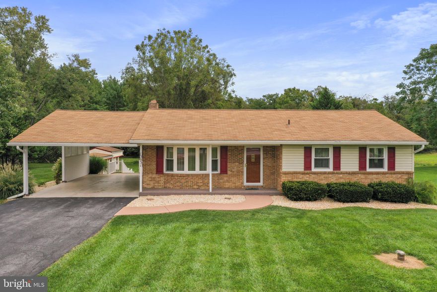 Don't miss this lovely 3 bedroom, 1.5 bath rancher that sits on a .615 beautiful lot!  Large bright living room. Dining area with hardwood floors.  Kitchen offers plenty of cabinet space (cherry cabinets), corian counter tops, smooth top stove, built in microwave, and side by side refrigerator with ice maker.  Family room in lower level with gas fireplace, recreation room, laundry area, and half bath.   Sliding glass doors that lead to covered patio to enjoy this beautiful lot. Pond beside the patio to relax to the sound of trickling water or fill it with your favorite fish.   Two car carport to use for parking or another entertaining outdoor area!  Shed and more!  This home was loved and well maintained!