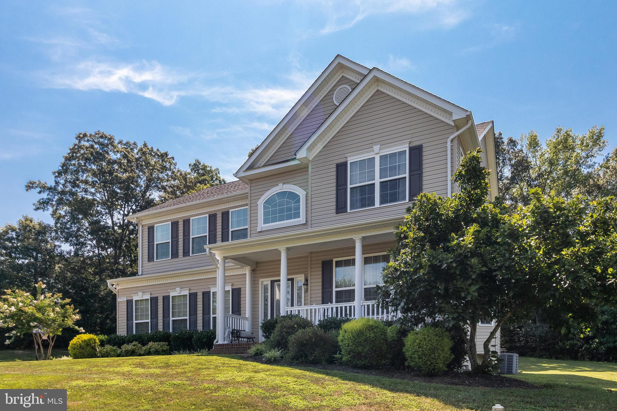 Welcome home to your 1+ acre piece of paradise in the sought after Grandview Haven! Professionally landscaped, you'll notice the pride in ownership the second you pull in. Side load two car garage. Front porch. Gleaming hardwood flooring, crown & chair molding, and 9' ceilings throughout the main floor. Granite countertops, upgraded refinished 42" cabinetry, & like new stainless steel appliances highlight the kitchen. Oversized family room with cozy gas fireplace. Four large bedrooms, with walk in closets galore, greet you as you make your way upstairs. The highlight of the upper level being the recently remodeled primary bath. Wow! Just wait, you'll be saying the same thing:) The basement level is complete with a full media room; Surround sound, projector & screen. Perfect for hosting football on Sunday's or sitting back in your recliner enjoying a movie night with the family. Custom sun deck. Large yard which backs to trees. All that's left to do is start packing. Truly a must see. You will not be disappointed.