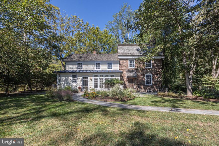 TWO RESIDENCES FOR THE PRICE OF ONE! Presenting the Matthias Harvye Estate, one of Bucks County’s most exceptional historic estates. Situated on three acres between the Delaware River and the Canal in Washington Crossing, this property represents a rare opportunity to own a significant piece of history. Upon entering via the distinctive red bridge over the canal, visitors are greeted by an atmosphere that reflects the property's storied past; historical records note that General Washington and his troops camped on these grounds prior to their march to Trenton.  The Canal House residence  originally constructed in 1709, has been thoughtfully updated to incorporate modern conveniences while retaining its period character. The home comprises 3 bedrooms and three and one-half bathrooms, featuring authentic hardware, pumpkin pine flooring, pie staircases, deep sill windows, and two fireplaces, complemented by amenities such as heated floors, walk-in cedar closets, and contemporary lighting. The estate also includes a second residence: a restored barn house, dating back to circa 1840 and relocated from Kutztown, Pennsylvania. This barn home offers three bedrooms, all ensuite, plus a full pool bathroom. It is equipped with a gourmet kitchen, complete with premium stainless-steel appliances, soapstone countertops, and cabinetry fashioned from reclaimed barn wood. Expansive ceilings and large windows create a bright, open environment, while wide plank floors and two prominent turned staircases enhance the interior. Noteworthy architectural details include Moravian tile mosaics and accents throughout. Outdoor features comprise of a rectangular inground pool surrounded by landscaped gardens and paver patios, as well as a covered three-season entertainment area constructed from the original barn stone walls, a substantial stones fireplace and a fire pit, with tranquil patio setting. The 1800’s springhouse is equipped with heating and cooling and has been converted into a gym on the first floor and a wine cellar in the basement.  Further amenities include a three-car detached garage with epoxy flooring and integrated storage, a custom pond populated with frogs and fish, back-up generators for both homes, direct access to the canal towpath, and proximity to historic Washington Crossing State Park, the Delaware River, and nearby towns such as Newtown, New Hope, and Yardley for dining and shopping. Professionally landscaped grounds with a custom night-time lighting system and meticulously maintained walkways lined with vibrant flowers all add to the estate's appeal.  Combining historical importance with contemporary comfort, the Matthias Harvye Estate presents a distinctive lifestyle opportunity in Bucks County. So, cross the red bridge and let this extraordinary property capture your imagination.