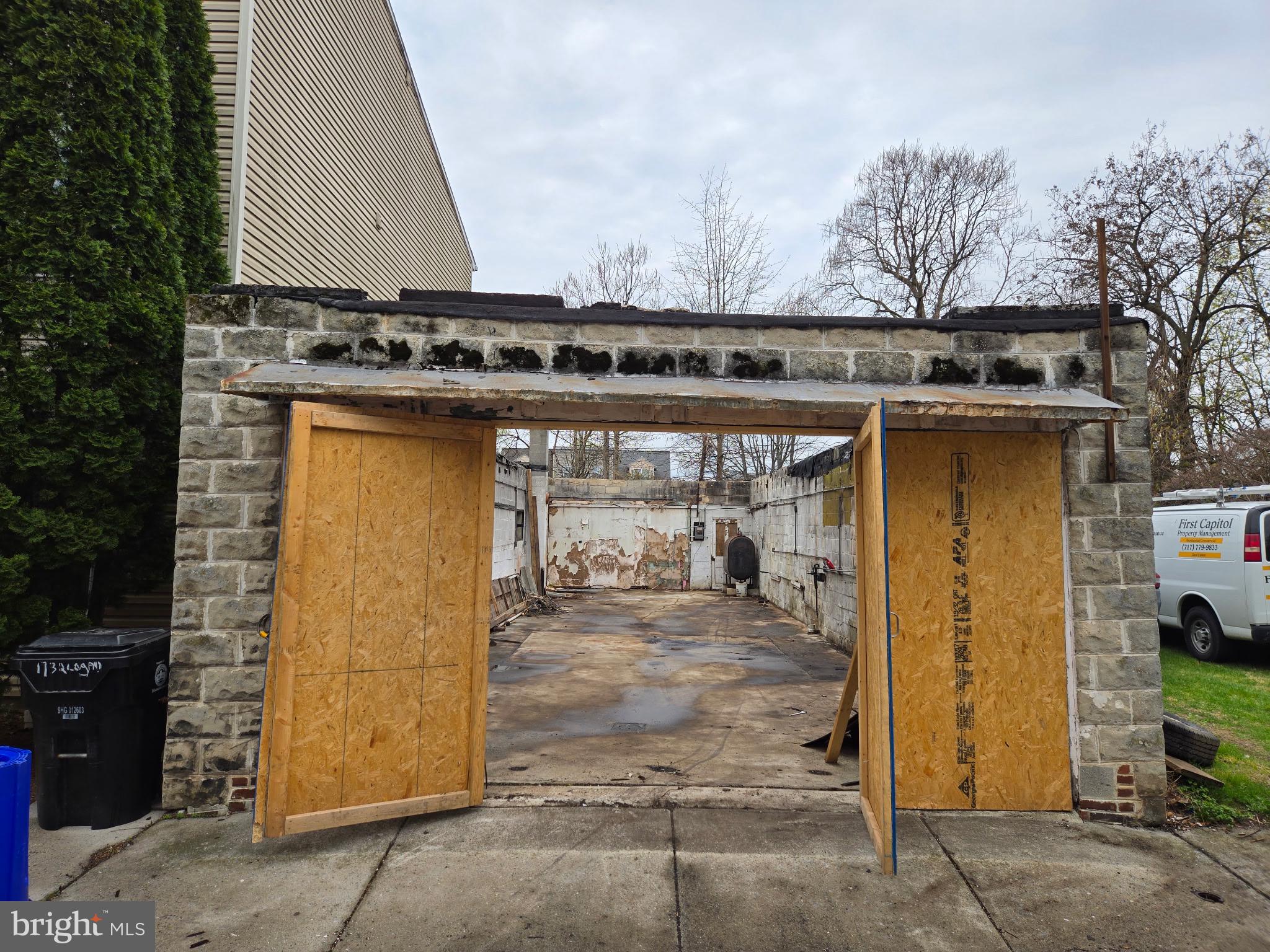 Former garage that just needs a roof put on. Has water meter already. Has electrical service to the building. Lot extends from Logan Street to the alley behind. The lot to the right of the building is owned by Harrisburg Redevelopment Authority, so potentially it can be purchased. Building is officially condemned and building permits will need to be pulled for improvements to be made to the property.