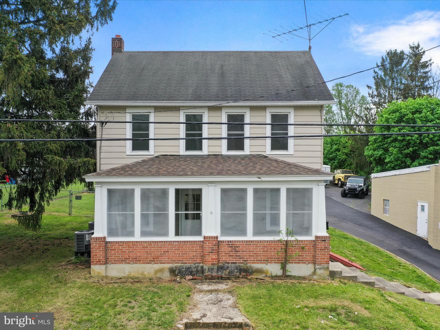 *3D tour available!* Welcome home to this delightful 4-bedroom property where many essential updates have already been handled! Step inside and appreciate the newly renovated main floor bathroom with combined laundry space plus a main floor bedroom.  The kitchen is functional and is open to table space for a dining area. A nicely sized living room rounds out the main level floor plan. Upstairs you'll find a traditional layout with 3 bedrooms, one with attached den or play space, plus an updated full bathroom. Enjoy year-round comfort with efficient central A/C, while energy savings and comfort are enhanced thanks to all new windows. At the front of the home is an enclosed porch space with newly replaced porch roof. Outdoors, take advantage of the fantastic yard – featuring both a fenced area (perfect for pets or play) and a separate large, unfenced yard space offering room to roam. The basement is an unfinished style basement. Located conveniently on S Main St in Mont Alto, this home is ready for its next chapter.

Year built is unknown. 1900 used as a place marker based on characteristics of home and existence of deeds around that time.