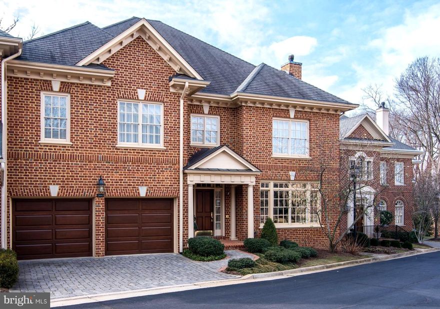 ST. PATRICK'S DAY OPEN HOUSE SUNDAY, 3/17 FROM 2-4 PM - APPROXIMATELY 8 MILES TO CRYSTAL CITY! - NEW PRICE!  Luxurious with ELEVATOR! John Albrittain built! Larger than most single family homes. Stunning 4 BR, 3.5 BA on 3 Levels. in this masterpiece of architectural details with 3 Fireplaces, and a large 2 car garage with added storage. Large rooms, High Ceilings, French doors, State-of-the-Art Gourmet Kitchen w/granite island/counters, Butler's pantry and top-of-the-line appliances. Master Suite with Sitting Room/Fireplace & Enormous Luxury Master Bath with Breakfast/Evening Bar. Upper Floor Exercise Room and Fantastic Media Room (lounge chairs convey)!