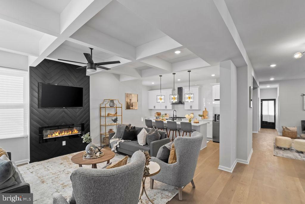Welcome to 3118 Ferndale Ave in Gwynn Oak! This luxurious 7-bedroom, 5-bathroom home with 5100+ Sq Ft spans across 4 levels, offering the epitome of elegance and comfort. Step inside and be captivated by the open-floor concept, boasting 9-ft trey ceilings, custom modern railings, recessed lights, and a stunning custom accent wall. The heart of this home is the chef's kitchen, featuring top-of-the-line appliances including a Samsung touch screen refrigerator, a large island with quartz countertops, a 5-burner stove with a custom hood range, a custom backsplash, and 42" soft-close cabinets. This space is perfect for culinary enthusiasts and entertaining guests. This remarkable home offers not one, not two, but three primary suites with one on the 1st level & two on the second floor. The main master suite is a true retreat, complete with a standalone soaking tub, a spa shower, dual vanity, his and her walk-in closets, a sitting area, a custom fireplace wall, and a private exterior deck. The second master suite features a spa shower with, a dual vanity, and a large walk-in closet. This home has been meticulously updated with a new roof, 2-zone HVAC, 200 Amp electric, gas, and plumbing work, ensuring worry-free living. Situated in Gwynn Oak, this home offers convenient proximity to a golf course, Lake Ashburton, shopping malls, Baltimore Zoo, SSA, parks, and major highways including i695, i70, and i83. Luxury living meets affordability in this exceptional property. Don't miss the opportunity to make 3118 Ferndale Ave your new home. Schedule a showing today and experience the true essence of refined living!