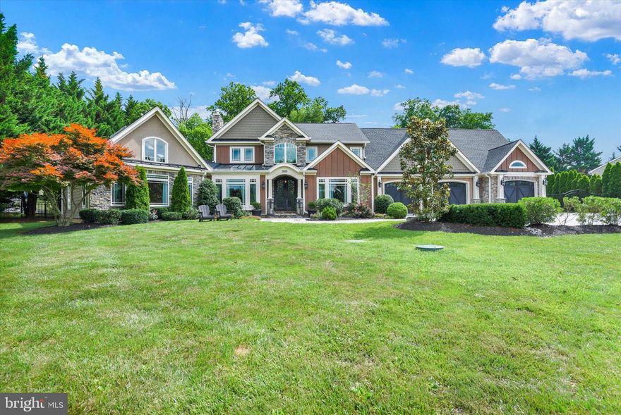 Imagine the dream home you have always longed for, hidden away in the sought after Peppermint Spring neighborhood in Westminster surrounded by trees on over an acre of land.  This luxurious masterpiece was fully remodeled 5 years ago with 4,000 square feet added. You will be captivated by the attention to detail at every turn from the magnificent double door entry to the grand entrance adorned with a custom chandelier and wide plank hardwood floors throughout the main level. This home is an entertainer’s delight and the formal dining room is designed with custom paneled wall accents, a dinette cabinet, and contemporary overhead lighting making it the perfect room to host friends and family for dinner parties. Off the dining room, the chef’s kitchen features a massive granite island with large pendant lighting, seating, a wine fridge, Kraftmaid cabinets with under-cabinet lighting, elegant backsplash, copper accents, and top-of-the-line stainless steel appliances. There is a cozy breakfast nook with built-in bench seating surrounded by windows, vaulted ceilings, and two skylights. The kitchen is open to the bright and spacious living room with a gas fireplace, and a walk out to your custom designed patio. A large office, main floor powder room, and a mudroom are also conveniently located on the main level. The grand primary suite is located on the main level and boasts vaulted ceilings with rustic beams, a stone gas fireplace, custom built-ins, and a separate sitting room. The dream walk-in closet provides abundant storage, a Calacatta Gold marble island, and a secondary stacked washer and dryer.  The ensuite spa bathroom offers the ultimate relaxation with a double vanity with ample storage, bench seating, heated tile floors, a large rainfall shower with 2 shower heads enclosed in Calacatta Gold marble and a soaking tub overlooking the backyard. There are 2 separate water heaters in the primary bedroom to ensure endless hot water. During the warmer months you will enjoy stepping outside your bedroom onto a stone balcony.  Upstairs is a thoughtfully designed loft with built-ins, making it an ideal space for reading, playing or doing homework. There are 5 generously sized bedrooms upstairs with tons of storage space!  A large bedroom with an ensuite shower and jacuzzi tub is located off the family room and a second full bathroom conveniently located to be shared with two bedrooms. There is a spacious upstairs laundry room equipped with ample cabinet storage and countertop space. The fully finished lower level features exquisite herringbone tile floors and is designed for entertainment with a game room and cozy theater room. There is a 7th bedroom that can be used as a guest bedroom, and offers direct access to the outdoor patio and pool.  Outside your oasis awaits with a heated saltwater in-ground pool surrounded by hardscaping, waterfalls, and lush landscaping. The two patios and play area create an ideal space for outdoor gatherings. Parking will never be an issue with an oversized 3-car garage that can accommodate your vehicles and offers ample storage space with built-in cabinets and a dedicated storage room. There is also a 2-car detached garage that is currently used as a shed. Modern comforts include a Dual-zone HVAC, an invisible dog fence, and an 8 Ring camera system providing security. This home is a true masterpiece, where every detail has been considered and crafted to perfection. Come and see this unparalleled home for yourself, and experience the elegance, space, and tranquility it offers. Make your dream a reality and turn this sprawling custom designed property into your forever home.