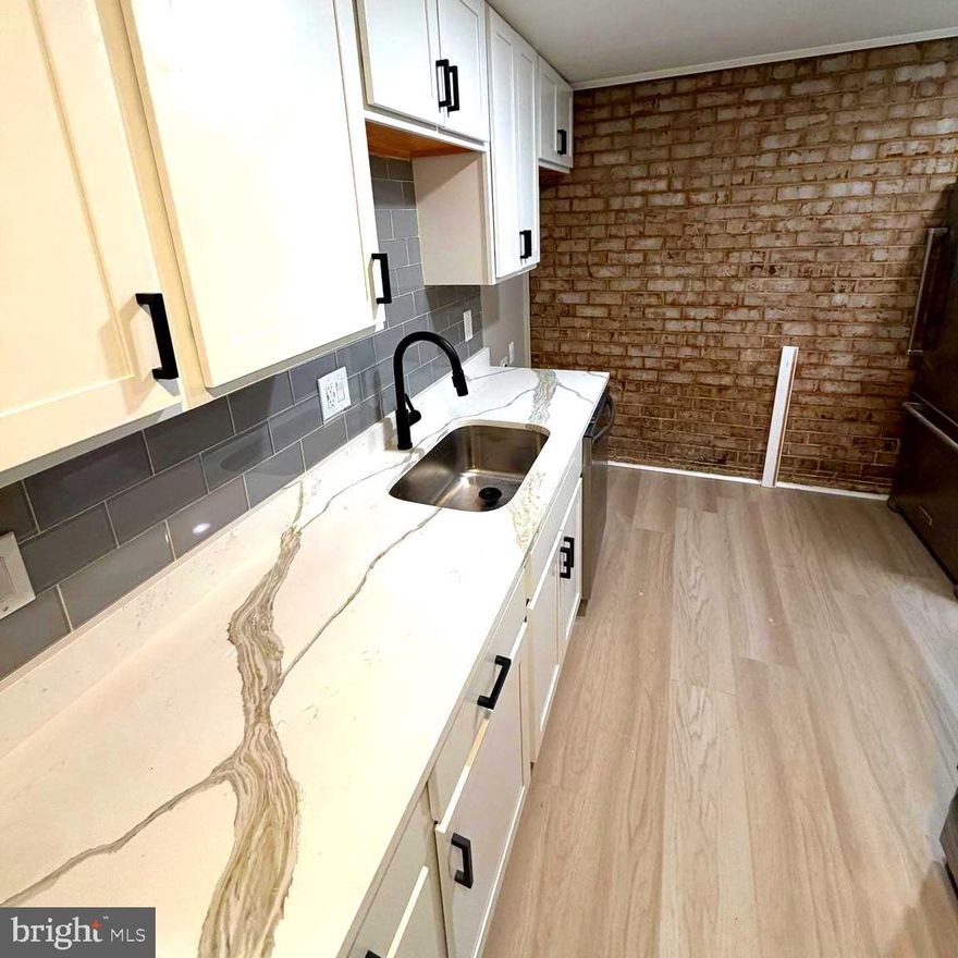Professional Photos Coming Monday 5/18
Stunning Updated Ground-Level Condo in the Heart of Temple Hills

Welcome to 3342 Huntley Square Drive, Unit T1 — a beautifully updated ground-level condo offering the perfect blend of comfort, style, and convenience in the heart of the Washington, DC metro area.

Step inside and you are welcomed by a bright, open floor plan designed for easy living and effortless entertaining. Fresh paint, sleek new flooring, and wide windows create a clean, modern feel throughout the home, while abundant natural light adds warmth and charm to every space.

The newly renovated kitchen is a standout feature, offering contemporary finishes, updated cabinetry, and plenty of room to prepare meals, entertain guests, or enjoy quiet evenings at home. The spacious living and dining areas flow seamlessly together and open to a private patio, creating the perfect spot to relax with morning coffee or unwind after a long day.

This inviting condo features two comfortable bedrooms and two full bathrooms, providing the ideal layout for privacy, functionality, and flexibility. Whether you need a primary suite, guest room, home office, or additional living space, this home delivers.

Located in the established Huntley Square community, residents can enjoy amenities such as a community pool, playgrounds, and green outdoor spaces. The location is hard to beat — just minutes from shopping, grocery stores, restaurants, Tanger Outlets, National Harbor, major commuter routes, public transportation, and Washington, DC.

Whether you are a first-time buyer, downsizer, commuter, or investor, this move-in-ready condo offers tremendous value, modern updates, and everyday convenience.

Welcome home to comfort, convenience, and easy living at Huntley Square.