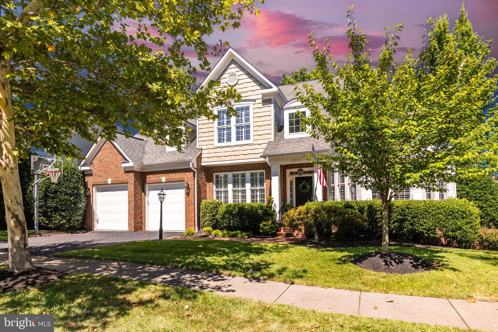 Upgraded Lansdowne Luxury! First time on the market by its original owners, this single-family home displays a rare pride of ownership with countless high-end updates, deluxe walk-out lower level and sprawling entertainer’s yard, all nestled near the golf course, schools and Potomac River in one of northern VA’s most sought-after communities. Welcome home to a picturesque, tree-lined street in Lansdowne on the Potomac, where friendly neighborhood is embraced by vast, manicured open spaces and naturally wooded areas. The home’s front elevation displays a two-stall, two-car garage, dormer windows, and a charming red-brick path inviting you in through the covered entryway. Inside, a grand double-height foyer makes a lasting first impression, unfolding on rich hardwood floors to a dramatic, sweeping staircase. The airy main level offers flexible living and entertaining arrangements, with a formal dining room and front living area bathed in natural sunlight, as well as a great-room style family room and kitchen. Completely renovated with high-end appliances, cooktop island, designer finishes and a huge bar-top counter, the gourmet kitchen is equipped to please even the most demanding home chef. In this open concept, effortlessly transition from kitchen to the adjacent eat-in area, movie nights around the family room fireplace, or out through sliders to your deck with remote awnings and beautiful wooded views. The main level also hosts a powder room, mudroom with storage, and a private office and workspace, offering multiple secluded options for remote work and schoolwork. Outside on your generously sized lot spanning nearly 1/4 acre, the side yard and garden path connect to expansive rear lawn and flagstone patio. Enjoy a fully equipped built-in outdoor kitchen and grill station, plus an adaptable mix of sunny and shaded patio, all backed by your lush lawn and tranquil tree views. Upstairs, retreat to your palatial primary suite complete with a bay window sitting area, soaking tub and separate step-in shower in the primary bath en-suite, and ample storage in a huge, ‘his and hers’ walk-in closet. This level also hosts three well-proportioned secondary bedrooms and two additional full baths, one a jack and jill bath, and a large laundry room conveniently nearby. The finished, walk-out lower level has even more immaculate living and entertaining space, including a multipurpose room with a custom wet-bar and full-sized stainless appliances, a separate game/rec room, bonus room currently used as a home gym, guest bedroom with walk-in closet, and yet another full bathroom with a bonus second laundry room. There are so many amazing amenities in this home, you have to experience it for yourself! Here at Lansdowne on the Potomac, residents enjoy access to indoor and outdoor pools, a fitness center, playgrounds, sport courts and aerobics rooms, a business center, ballroom, meeting rooms and more. Route 7, shopping and dining at Lansdowne Town Center, the Golf Club at Lansdowne, Lansdowne Resort and Spa, hiking trails and Elizabeth Mills Riverfront Park are all moments away. Welcome home!