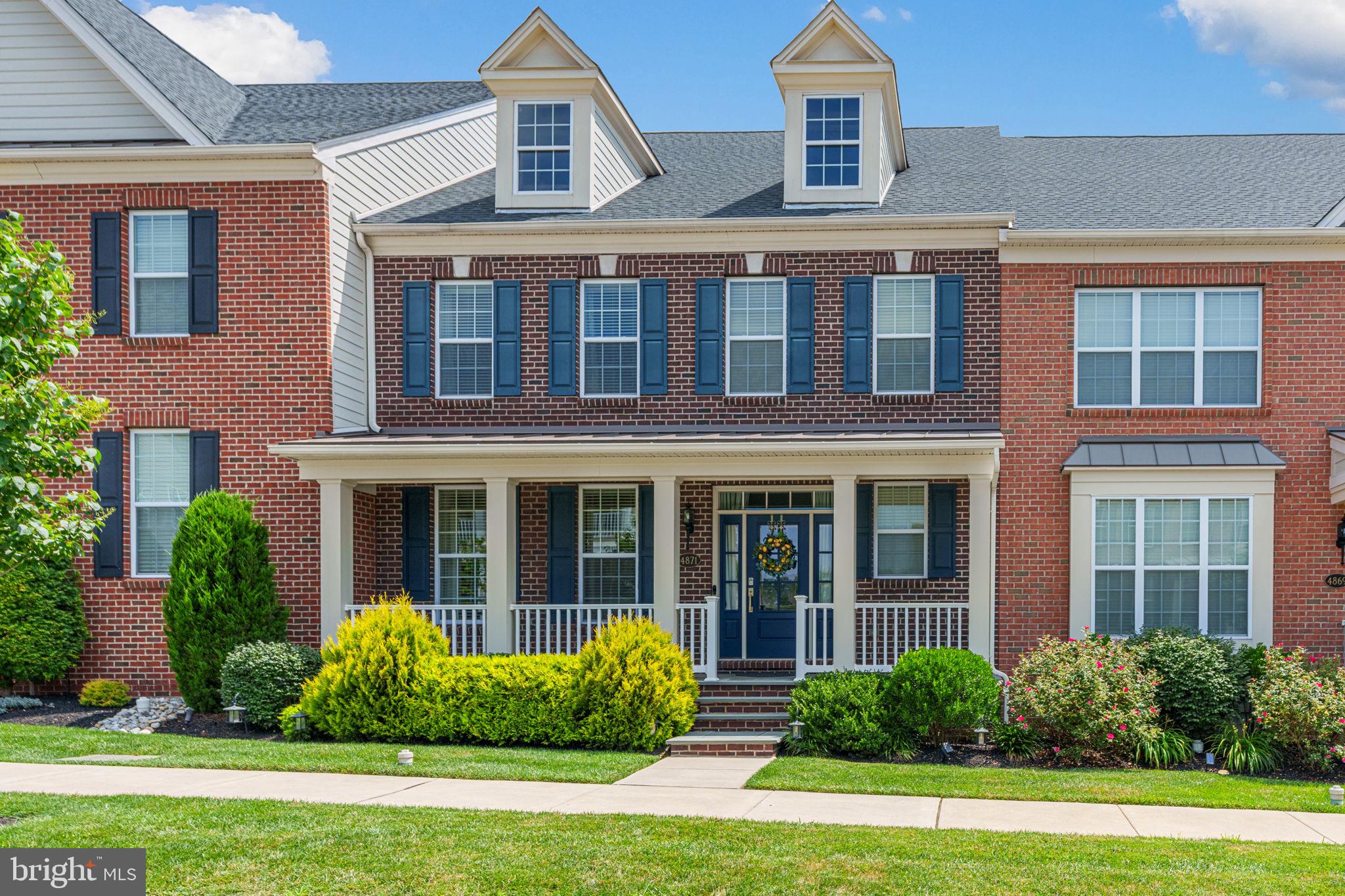Elegant Townhome Living on Blossom Drive in Fenton’s Corner, Doylestown! One of The Carriages Collection! Welcome to this beautifully upgraded 3-bedroom brick-front townhome on picturesque Blossom Drive, located in the highly desirable community of Fenton’s Corner—where timeless style, comfort, and convenience come together. A welcoming front porch sets the tone for this inviting home, perfect for morning coffee or evening chats with neighbors. Step inside to discover a light-filled interior with neutral paint colors, rich hardwood floors, and a graceful oak staircase that leads to the upper level, where hardwood flooring continues through the second-floor hallway. The spacious main level features a bright, open kitchen with a massive, gorgeous granite island, ideal for gathering and entertaining. You'll love the sparkling upgraded lighting, premium faucets, and sleek finishes throughout, including a stylish fireplace with upgraded mantel that anchors the living space beautifully. Upstairs, three generously sized bedrooms offer peaceful retreats, including a luxurious primary suite with ample closet space and a spa-like en suite bath. The full basement comes complete with a plumbing rough-in, offering flexibility for future living space, a gym, or media room. Step outside to your own cozy, private patio—the perfect spot to relax, grill, or enjoy a book in peace. Add in an upgraded entry door, 2-car garage, beautifully maintained landscaping, and a low-maintenance lifestyle, and you have a move-in ready gem. Fenton’s Corner is known for its manicured green spaces, walking trails, and vibrant community atmosphere—all just minutes from the boutiques, restaurants, and historic charm of Doylestown Borough. Commuters will love the easy access to Philadelphia and New York City via regional rail and nearby major routes, making this location as practical as it is picturesque. Don’t miss this opportunity to own an exceptional home on Blossom Drive—where upscale living and small-town charm are perfectly in sync. Schedule your private showing today!